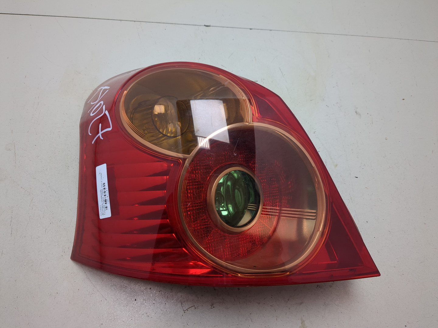 Фонарь задний левый