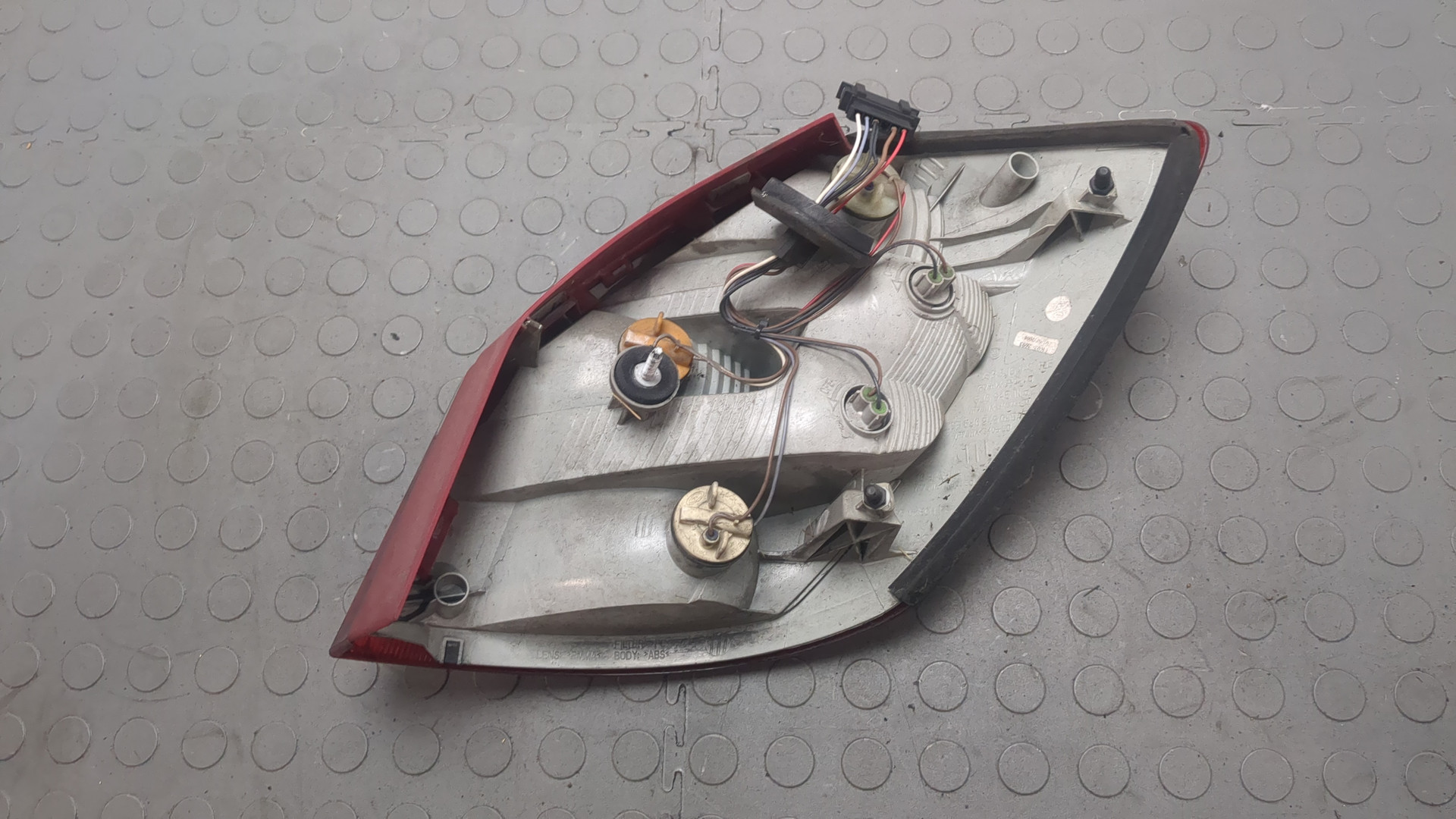 Фонарь задний левый