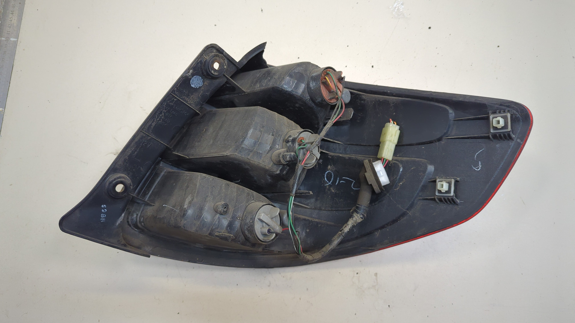 Фонарь задний левый