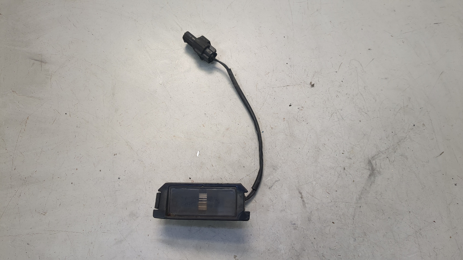 Фонарь подсветки номера