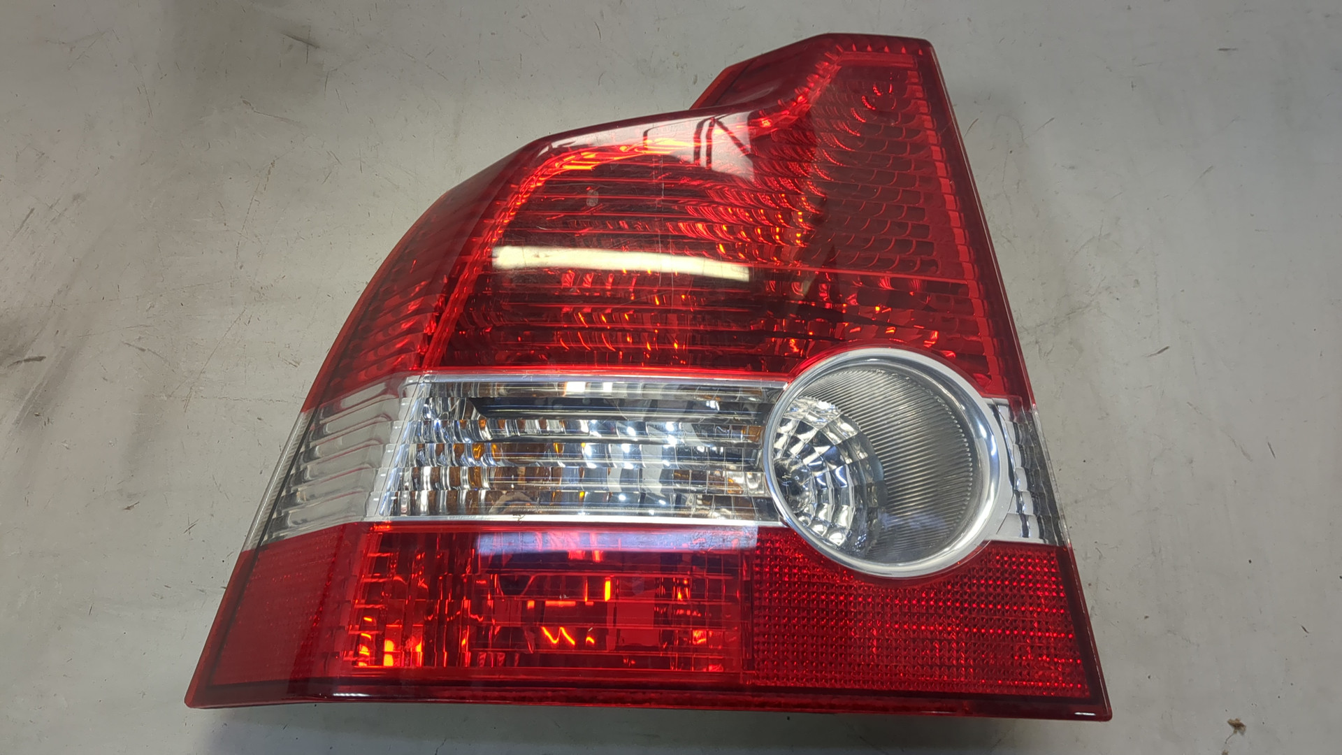 Фонарь задний левый