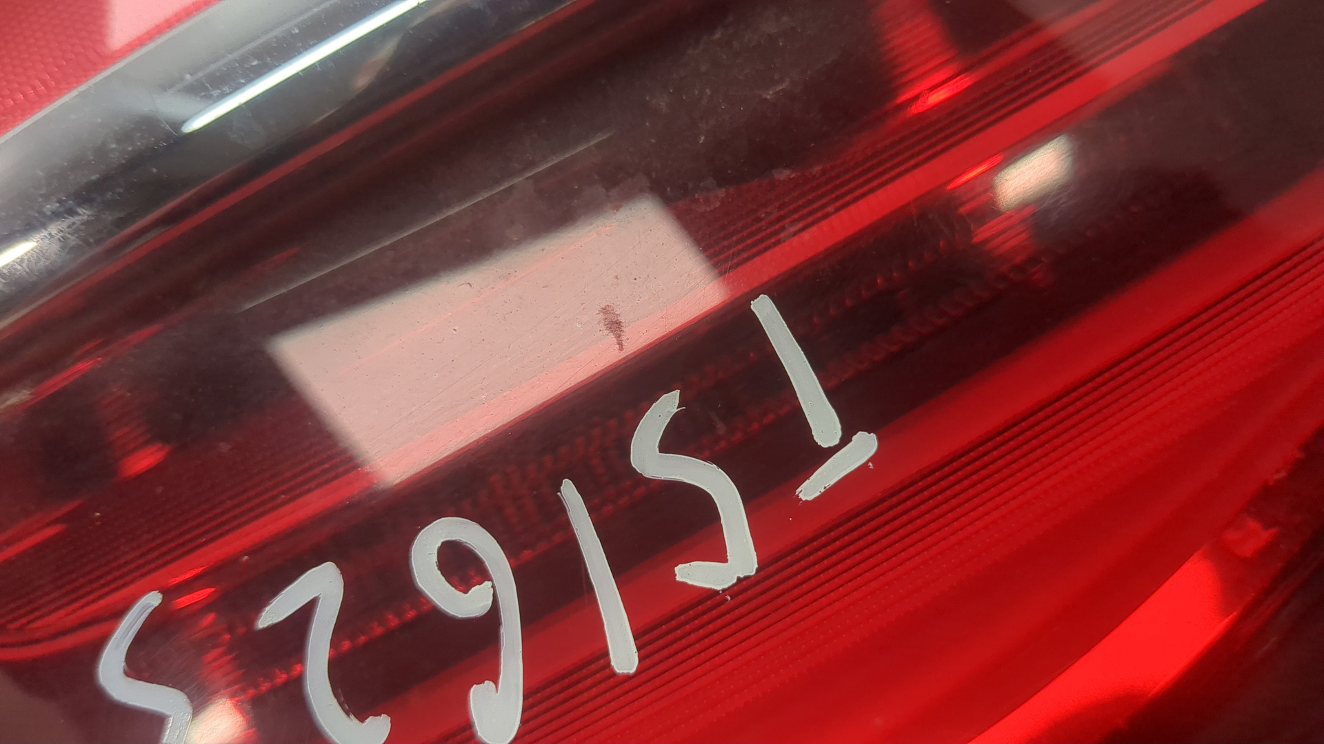 Фонарь задний левый