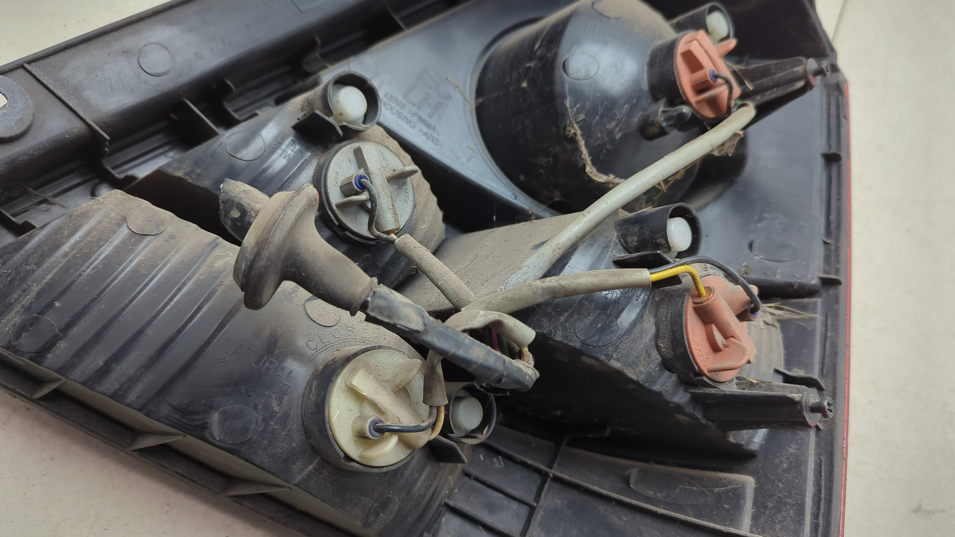 Фонарь задний левый