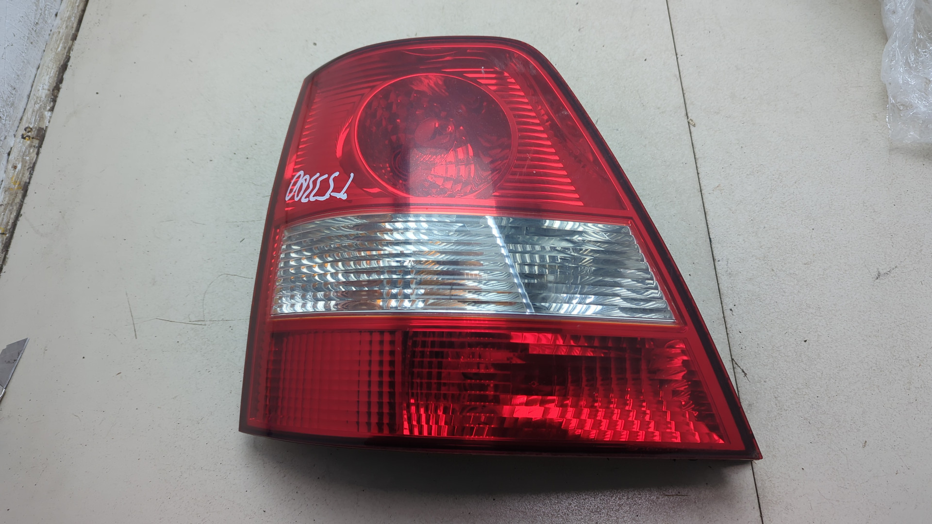 Фонарь задний левый