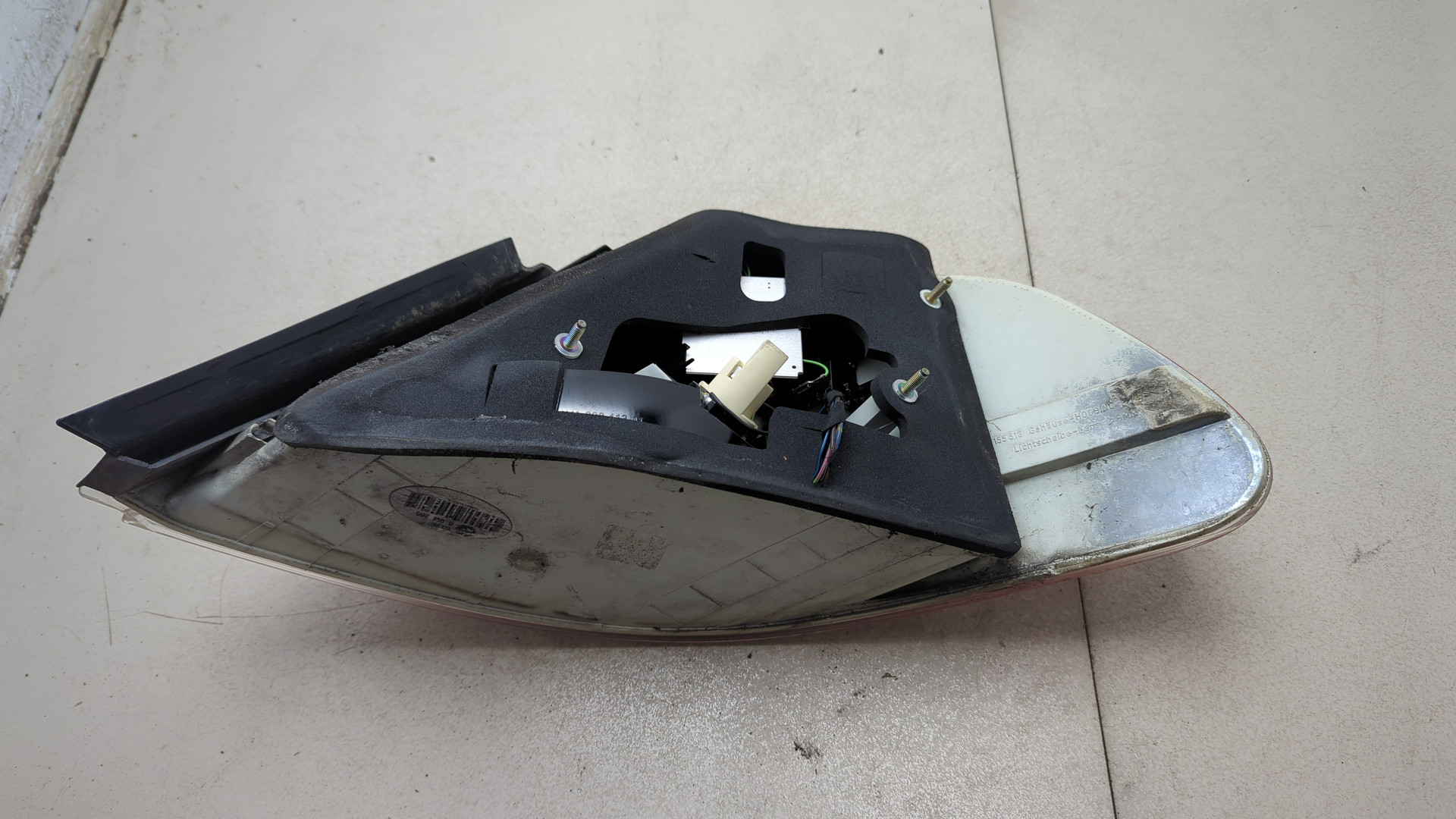 Фонарь задний левый