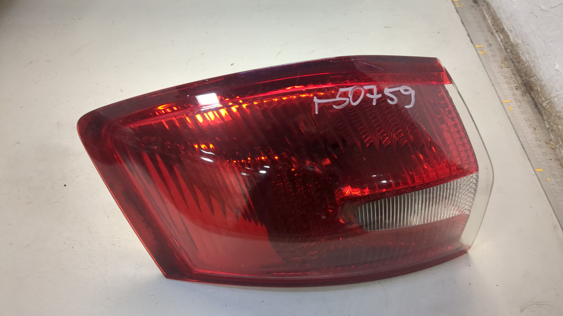 Фонарь задний левый