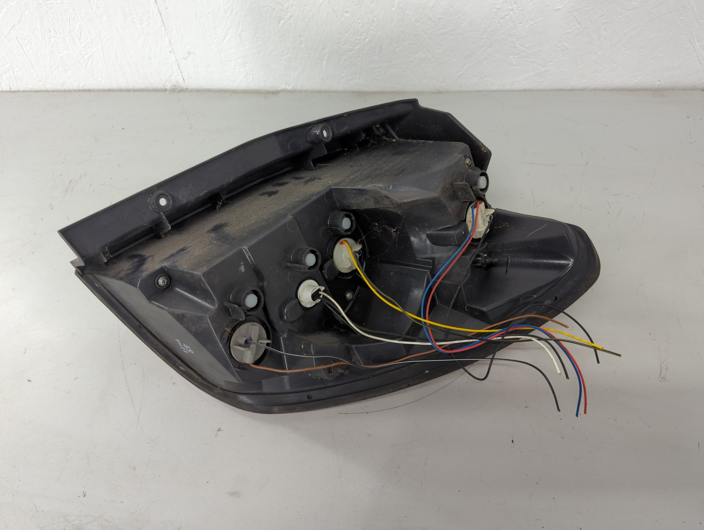 Фонарь задний левый