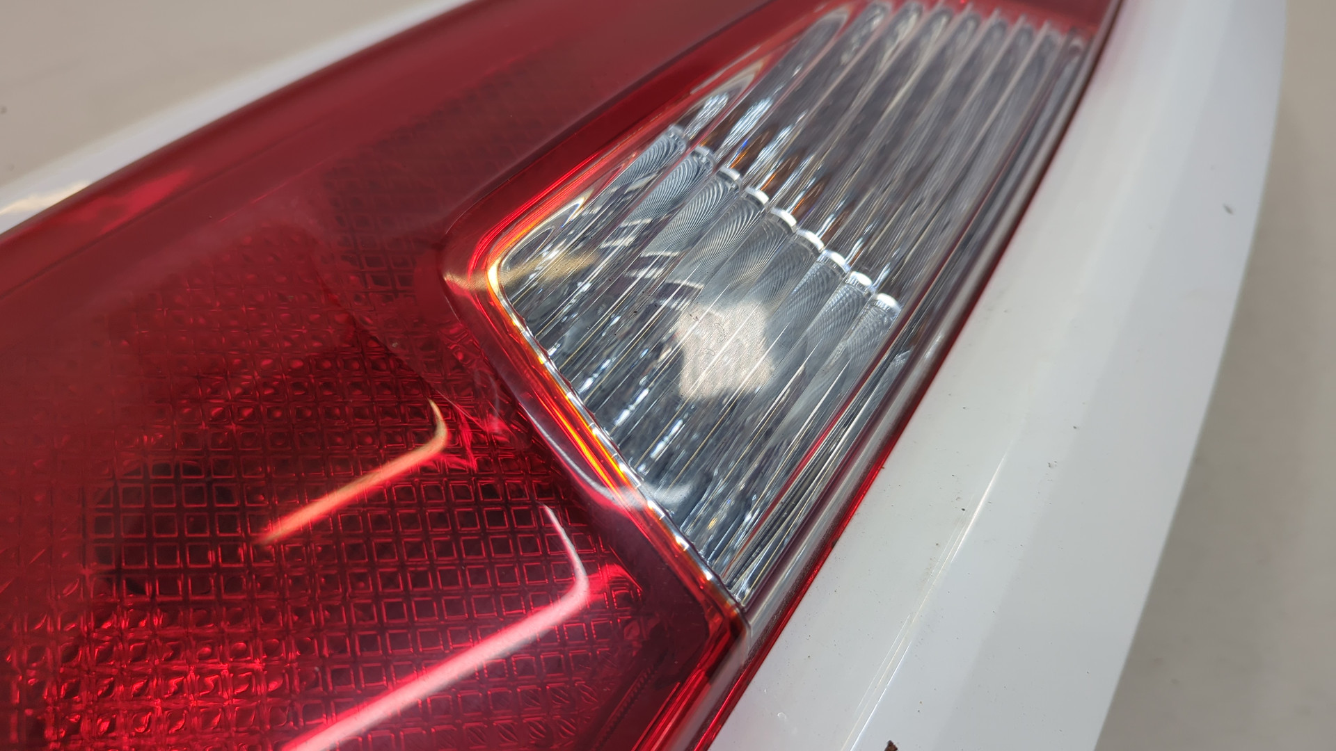 Фонарь задний левый