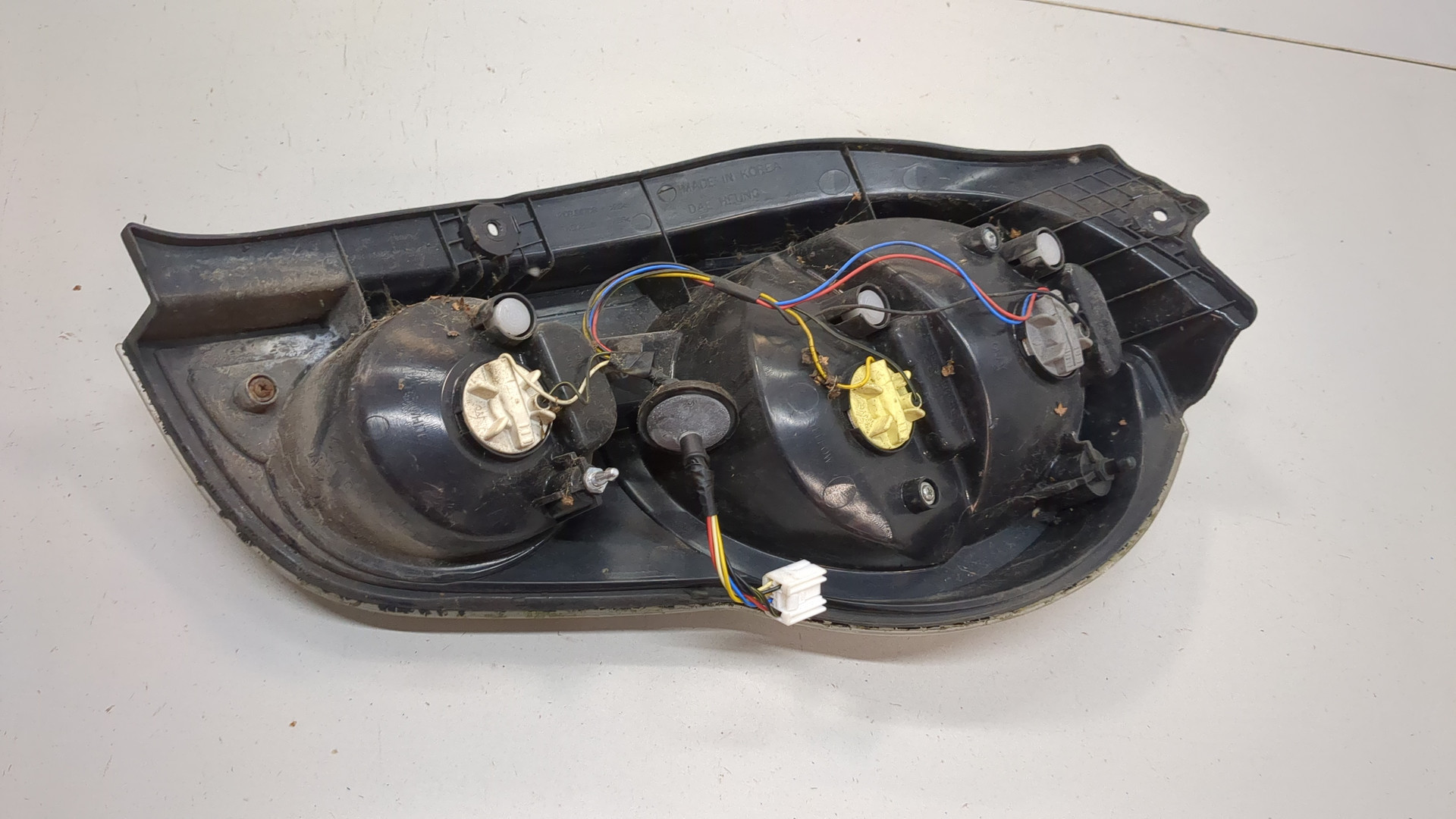 Фонарь задний левый