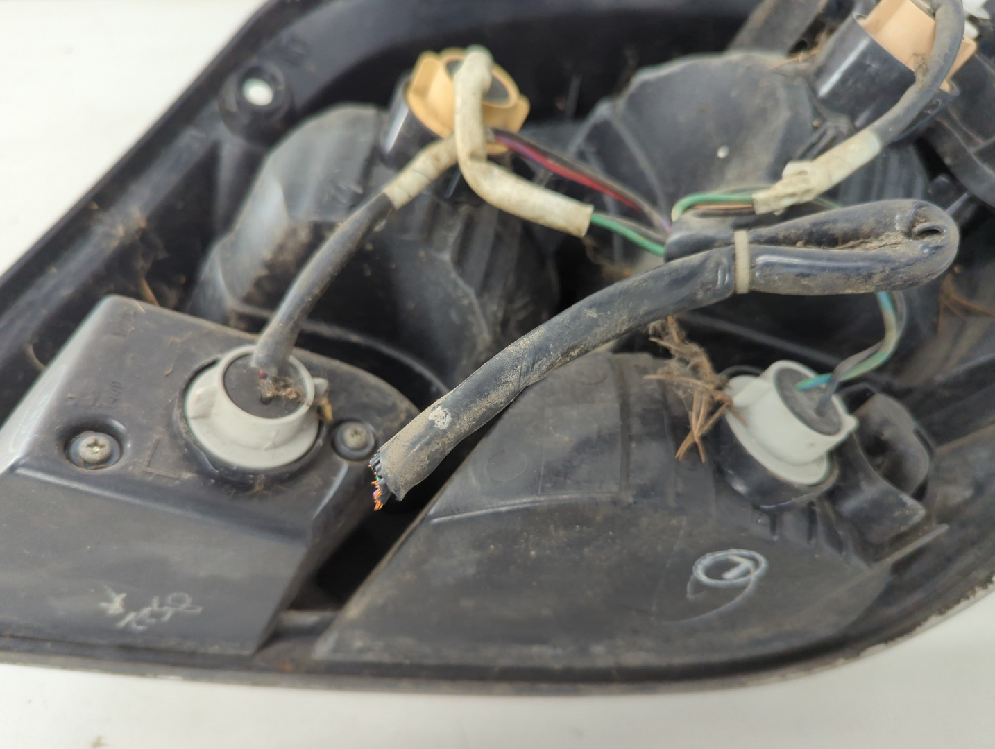 Фонарь задний левый