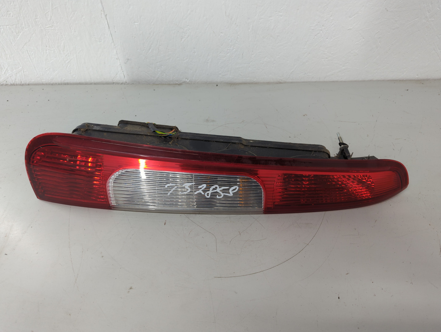 Фонарь задний левый