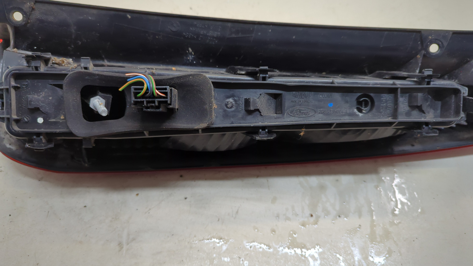 Фонарь задний левый