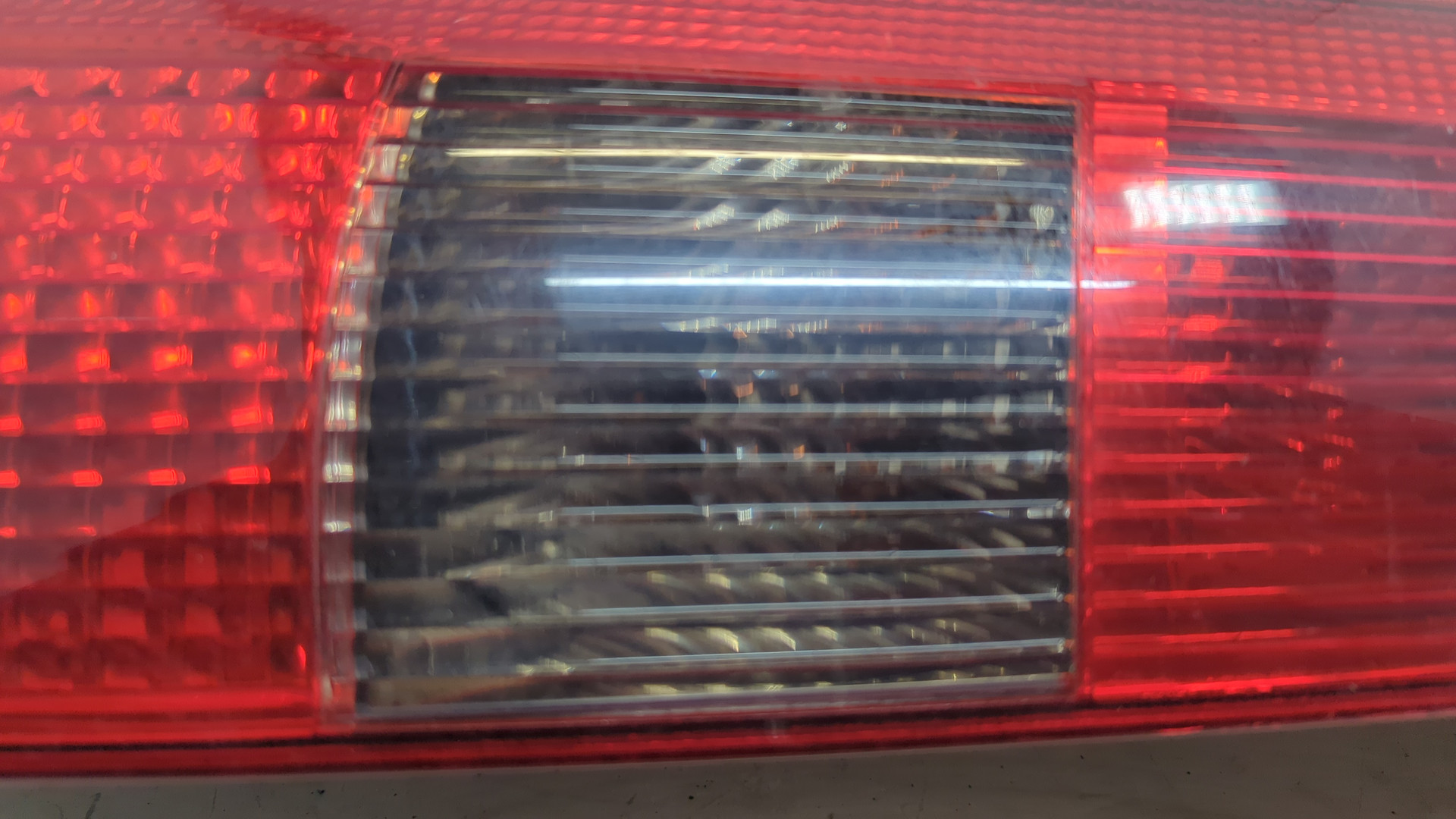 Фонарь задний левый