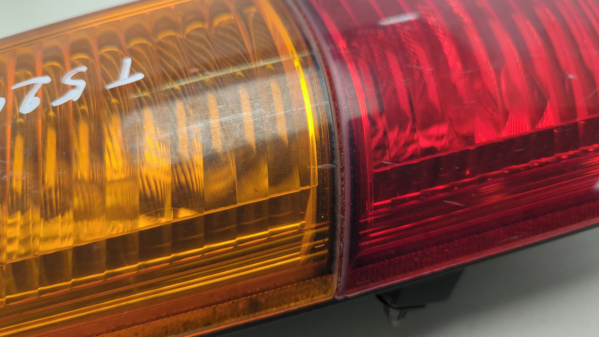 Фонарь задний левый