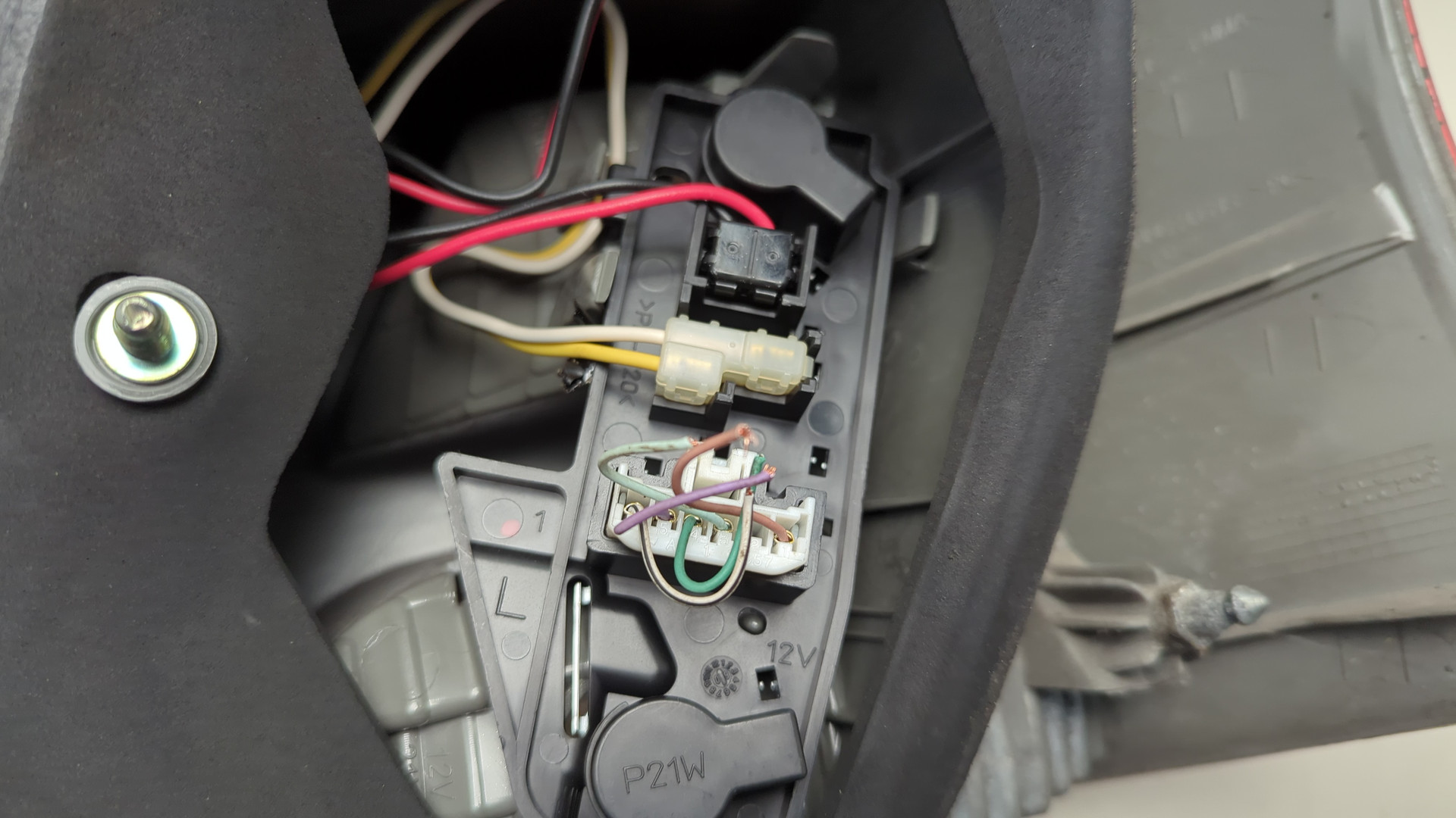 Фонарь задний левый