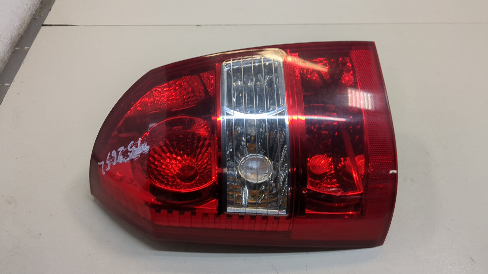 Фонарь задний левый