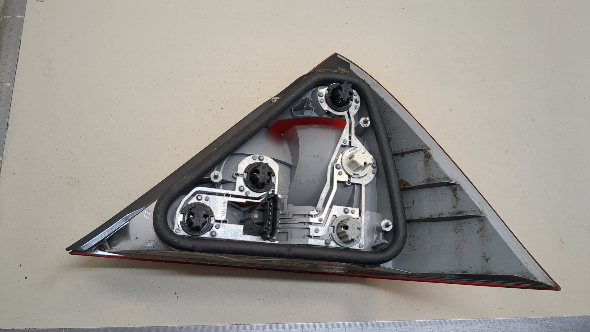 Фонарь задний левый