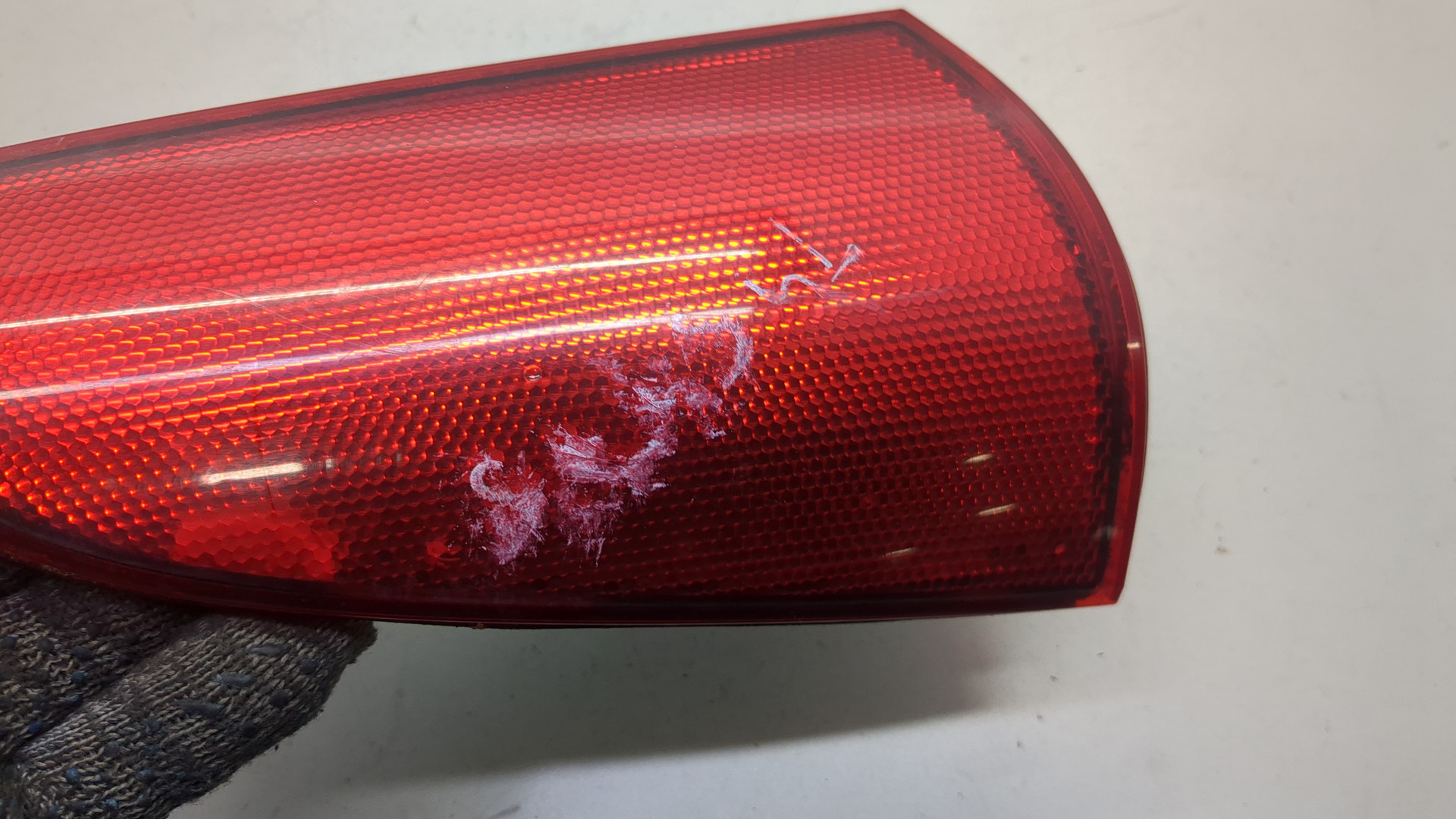 Отражатель в бампер задний левый