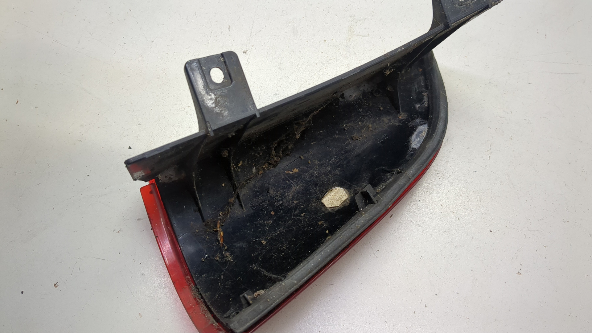 Отражатель в бампер задний левый