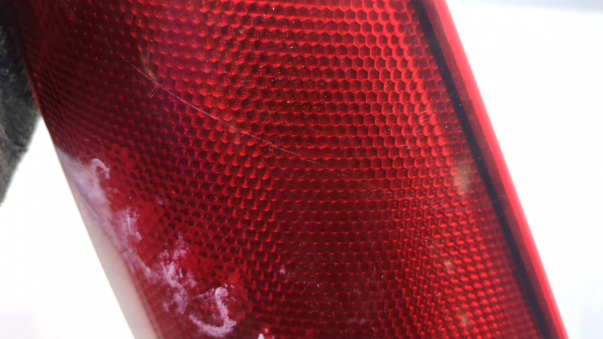 Отражатель в бампер задний левый