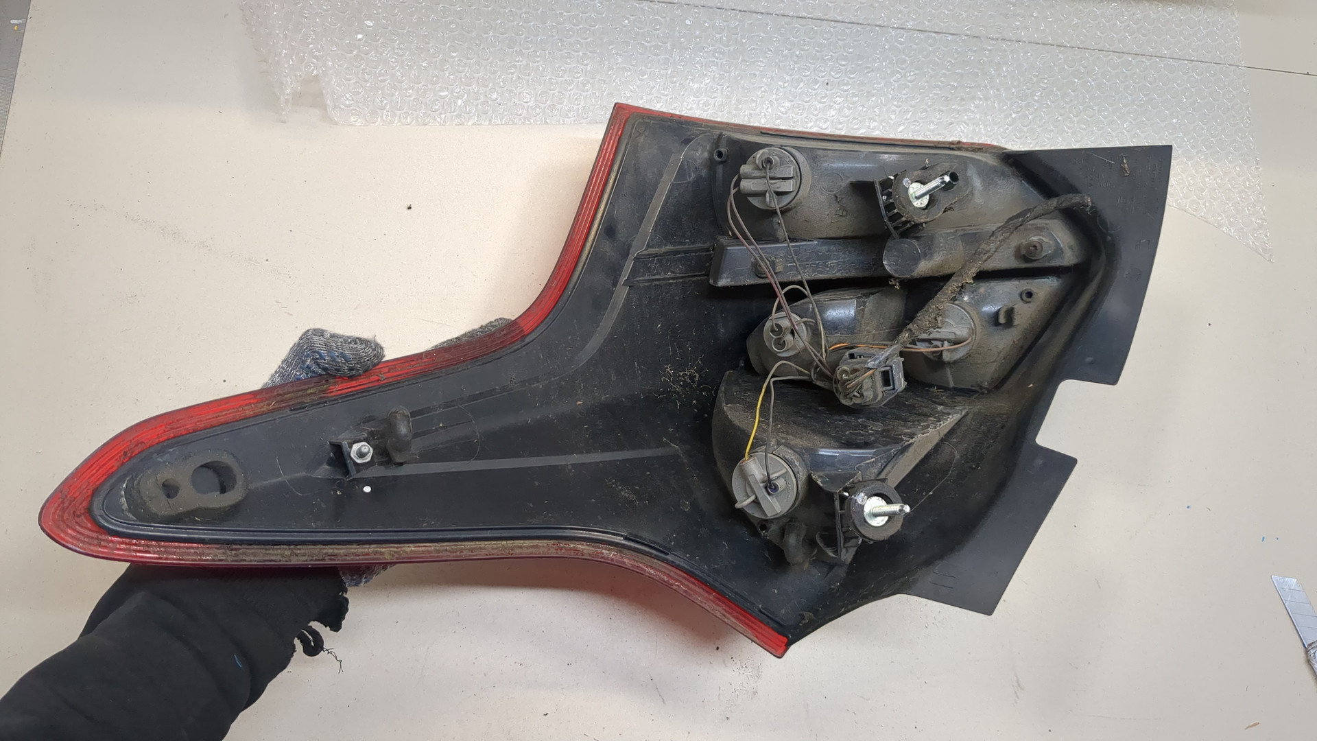 Фонарь задний левый