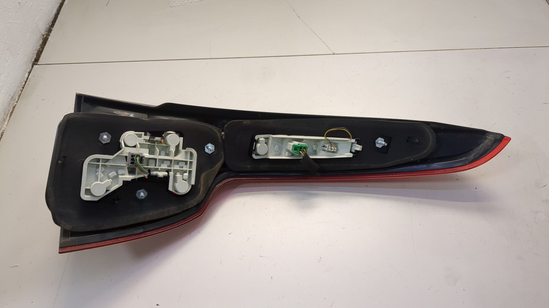 Фонарь задний левый