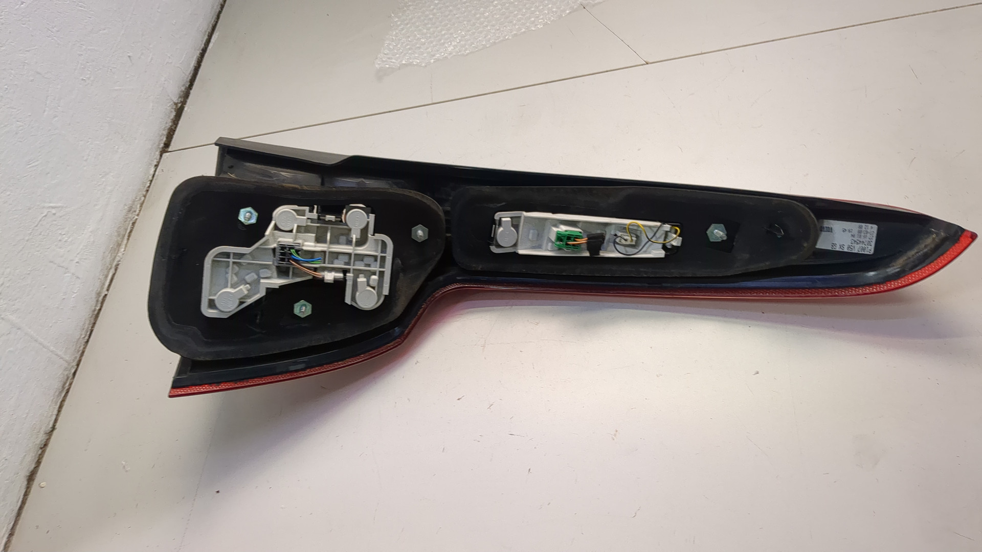 Фонарь задний левый