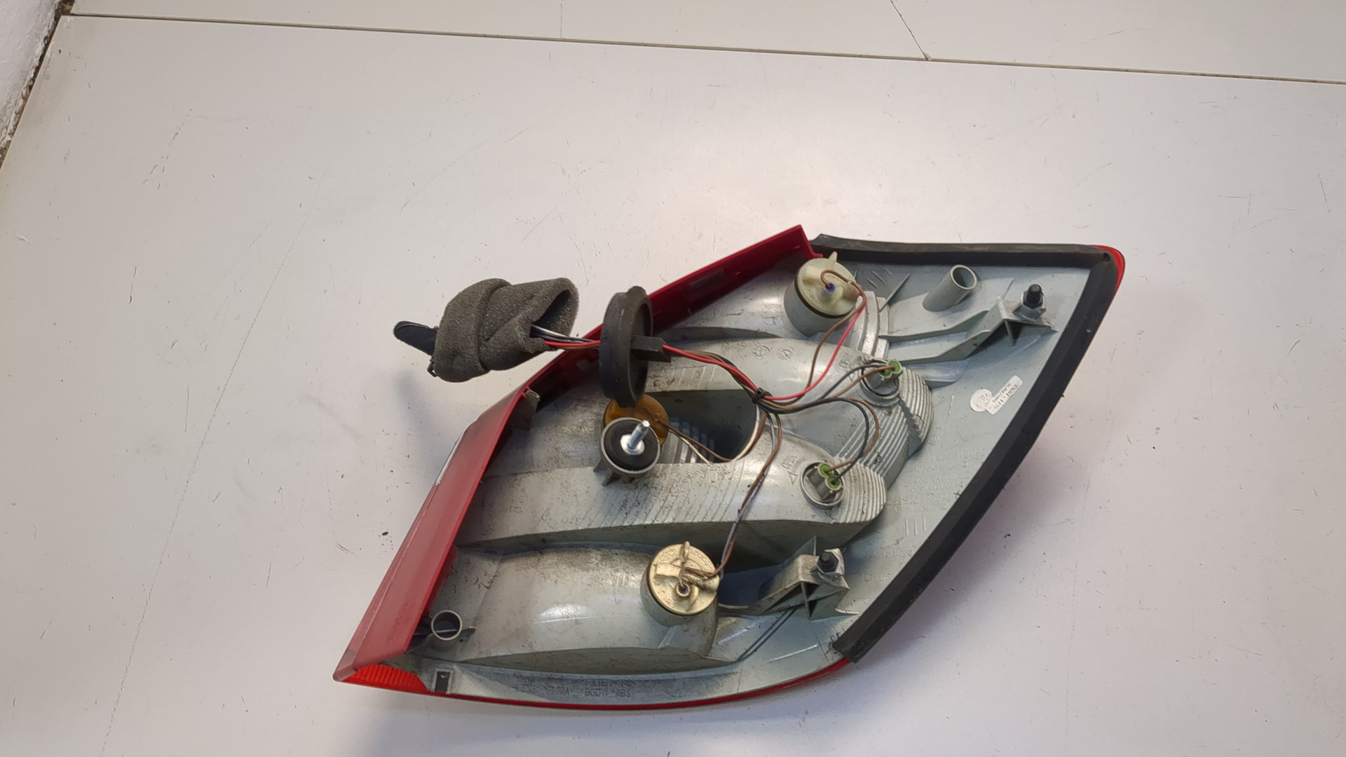 Фонарь задний левый