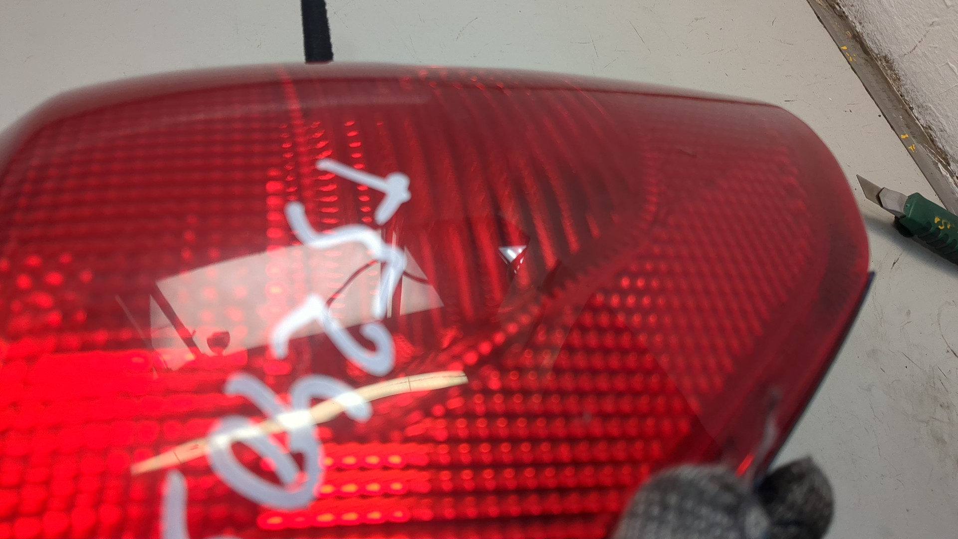 Фонарь задний левый