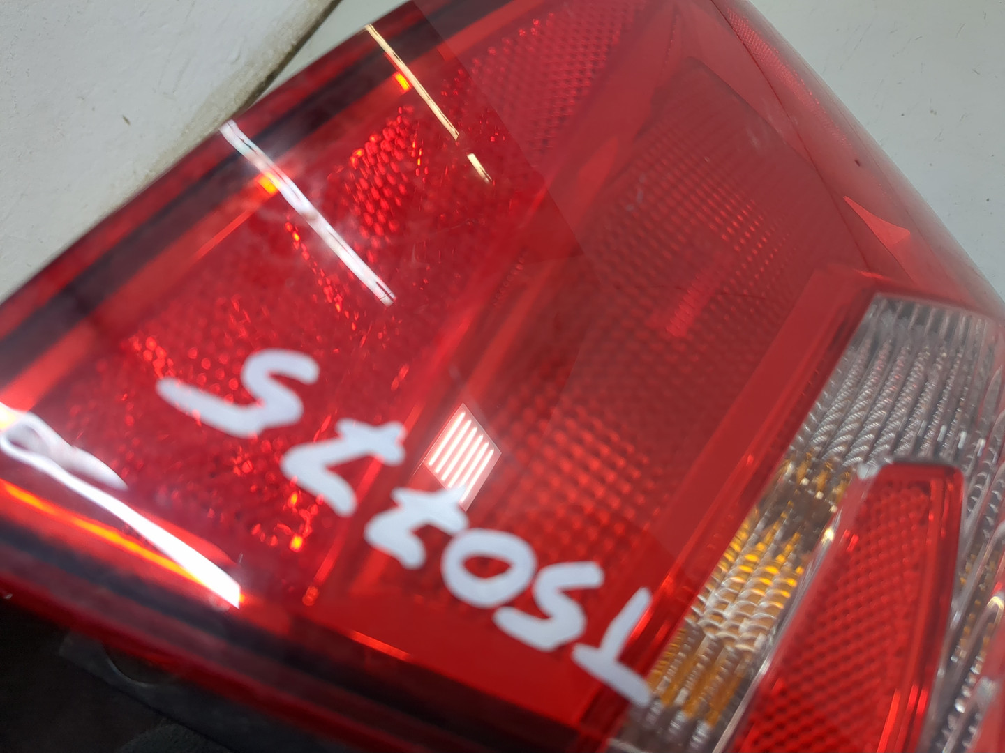 Фонарь задний левый