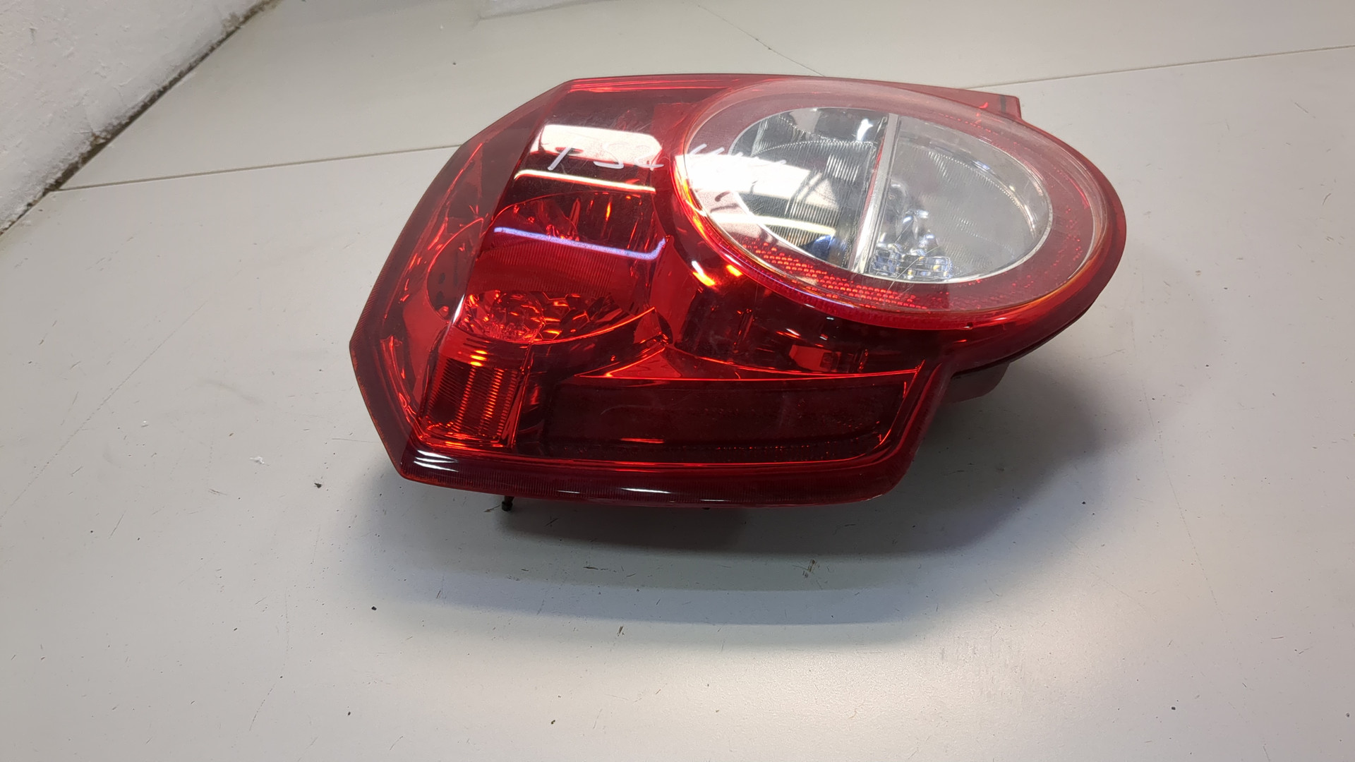 Фонарь задний левый