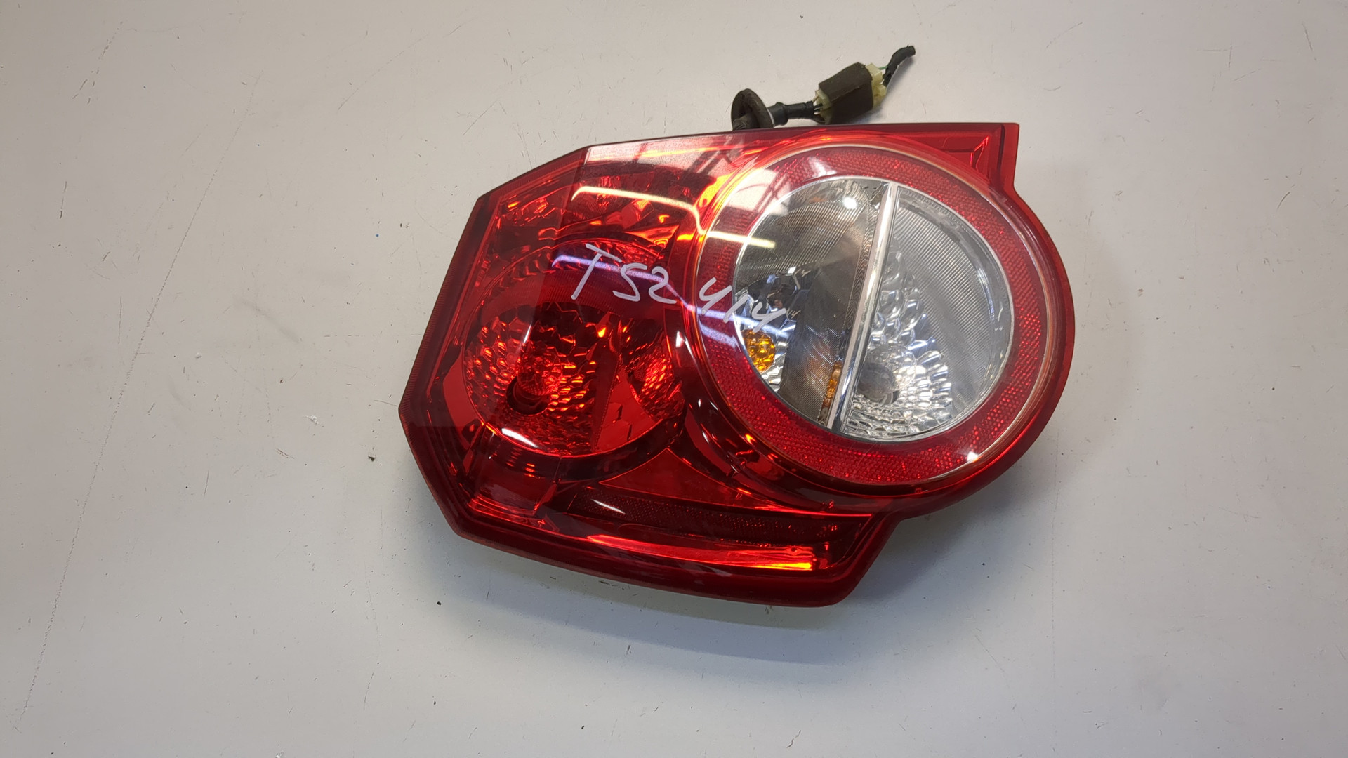 Фонарь задний левый