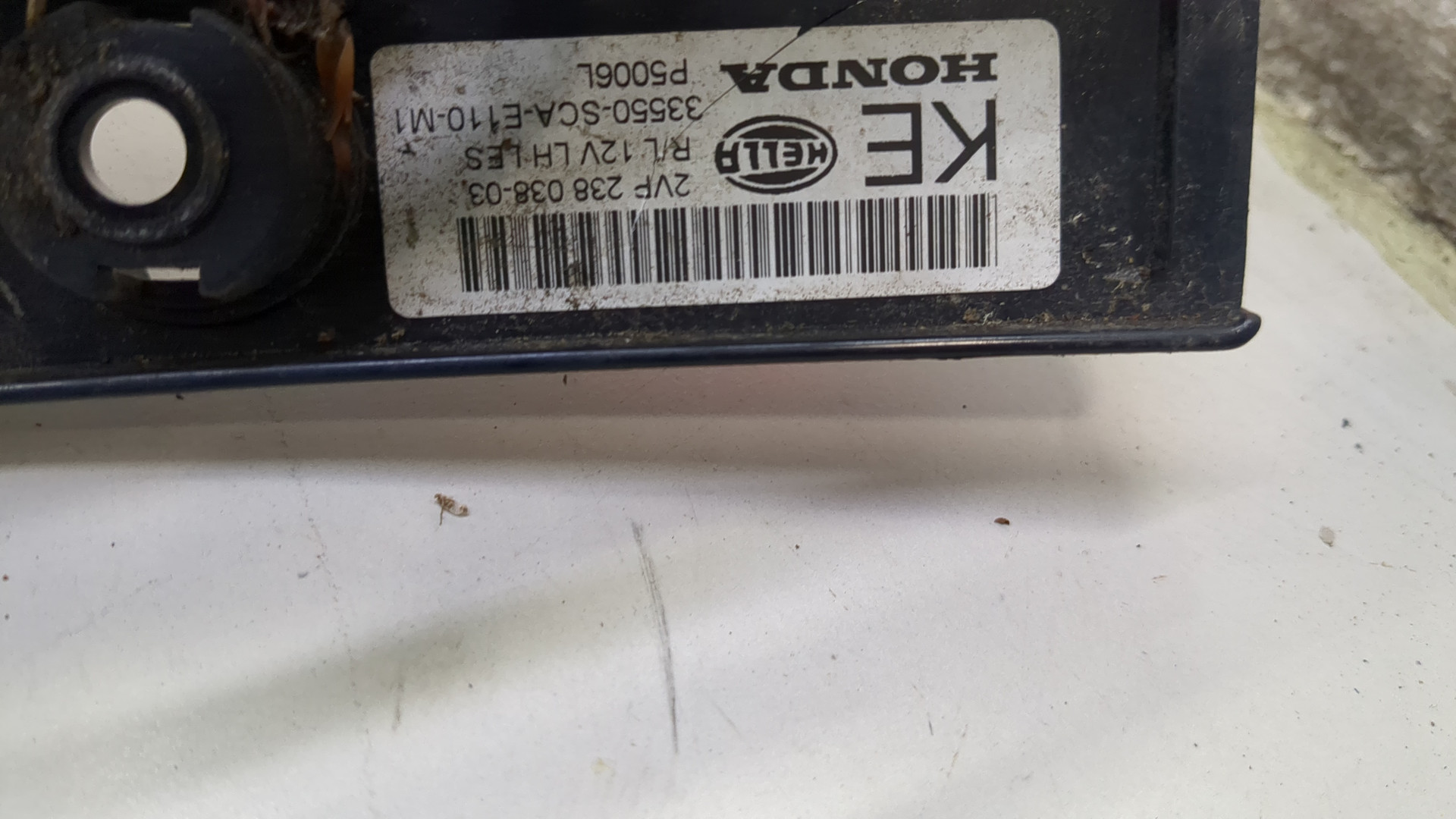 Фонарь задний левый