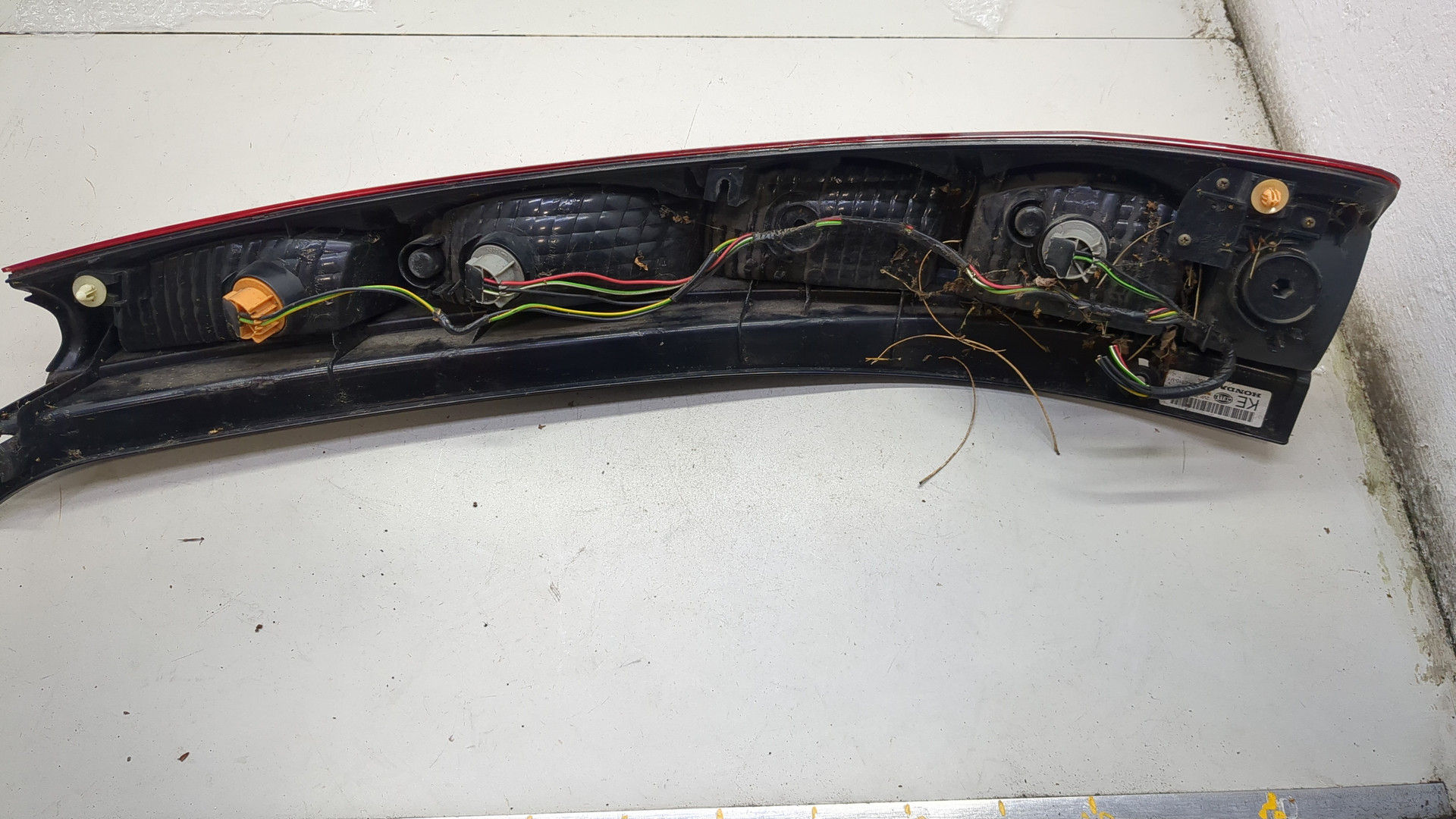 Фонарь задний левый