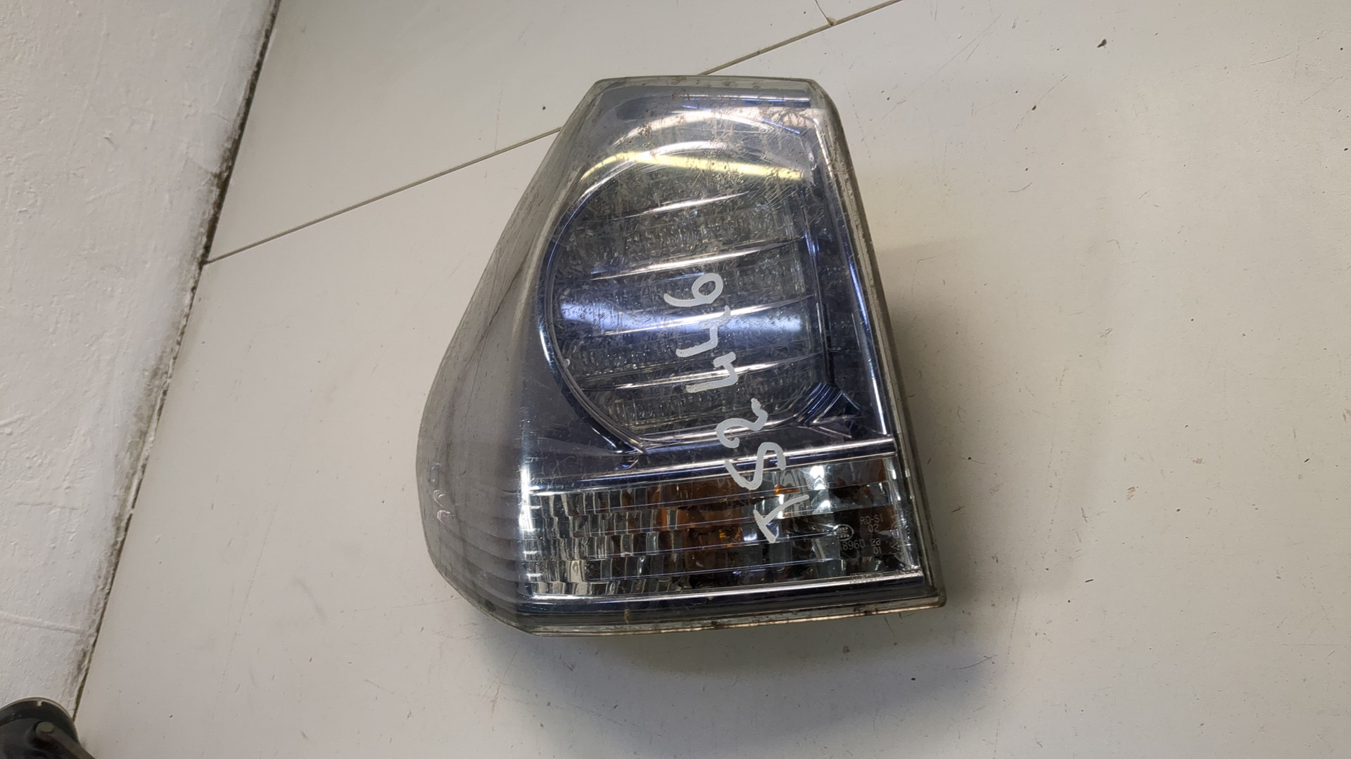 Фонарь задний левый