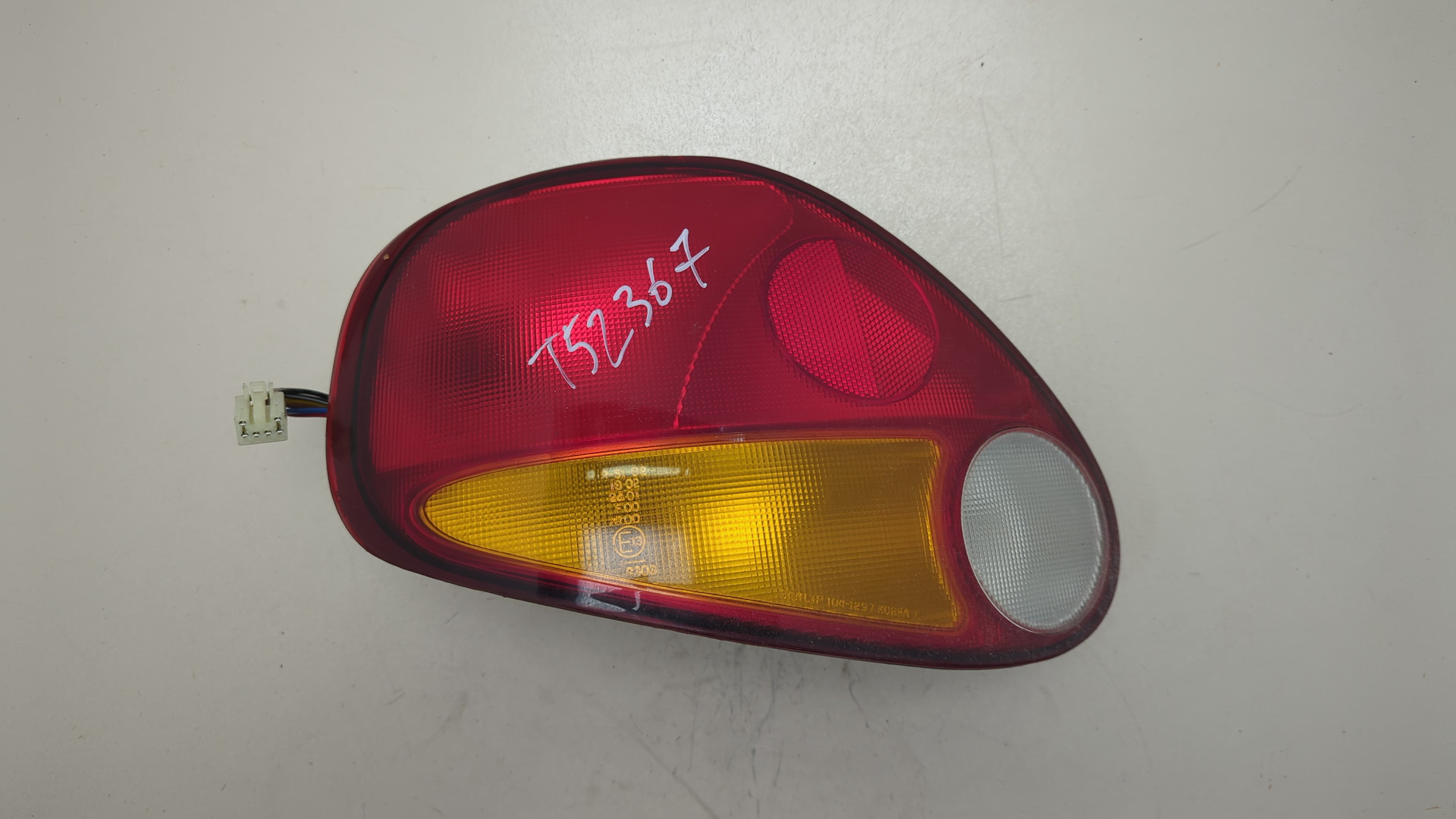 Фонарь задний левый