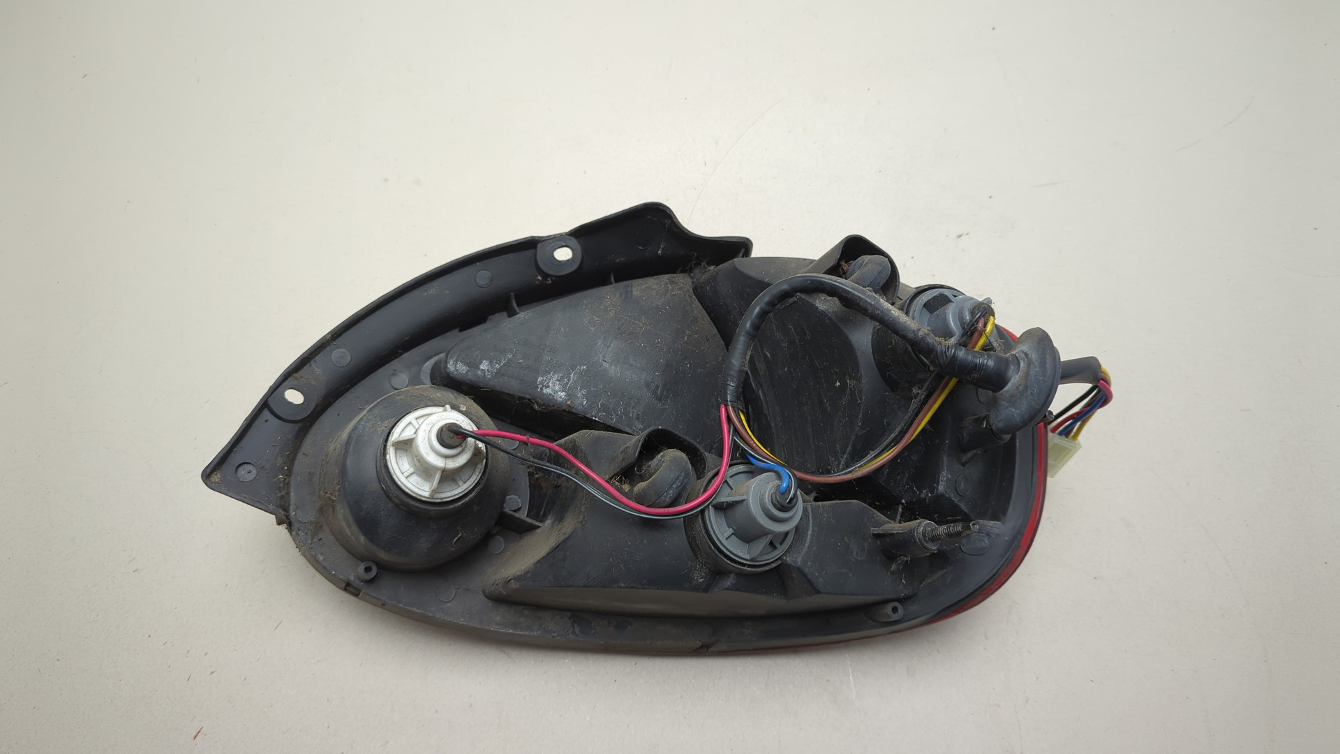 Фонарь задний левый