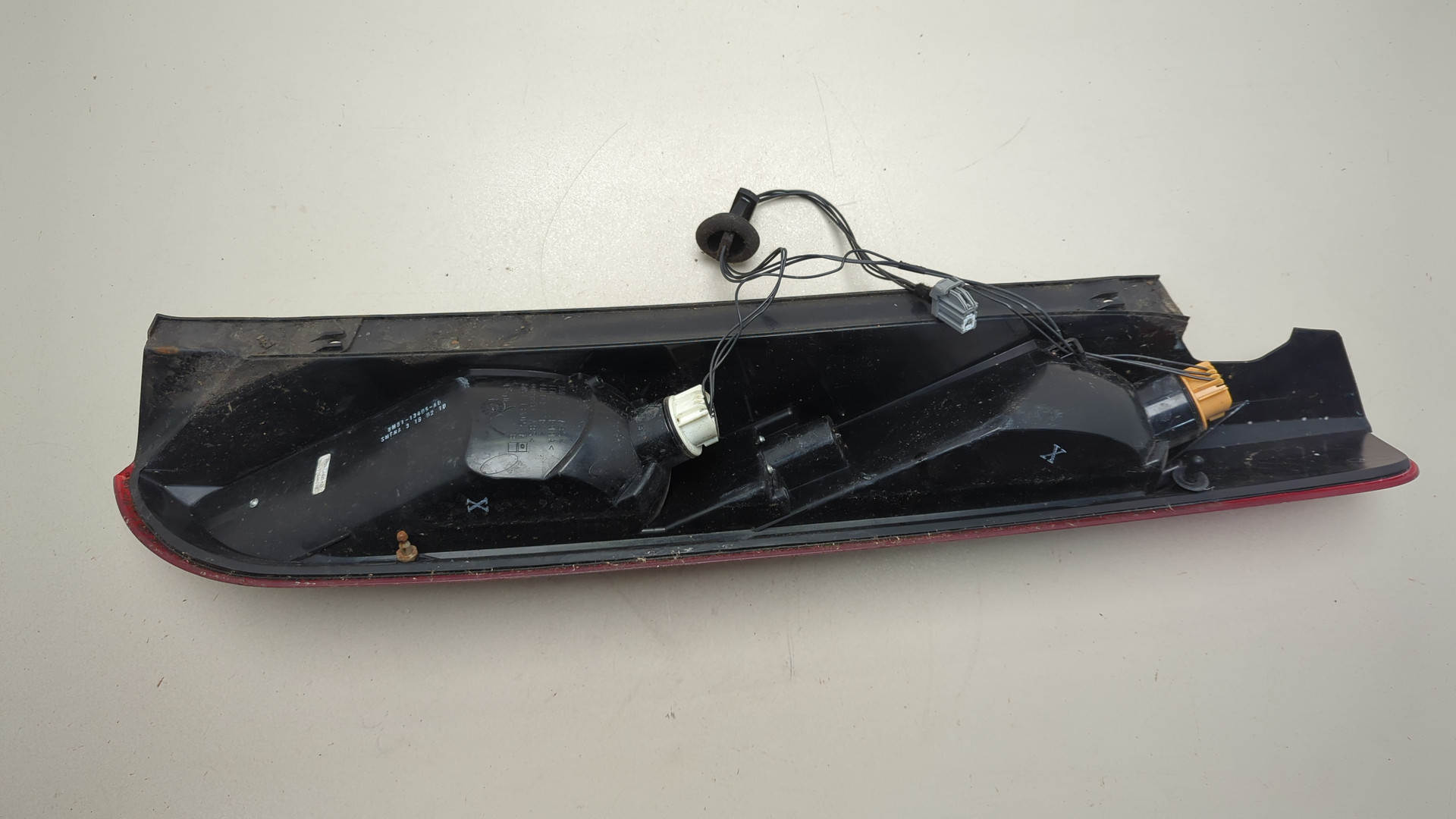 Фонарь задний левый