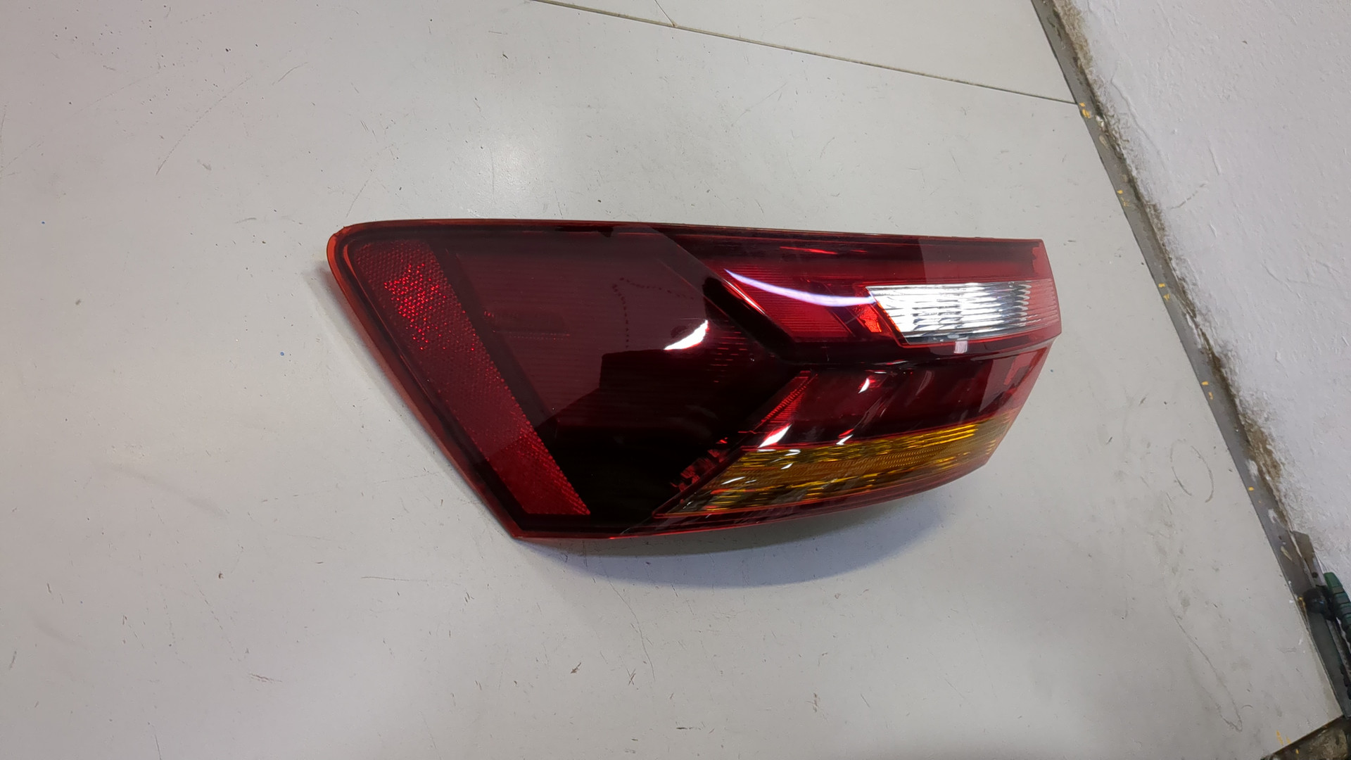 Фонарь задний левый