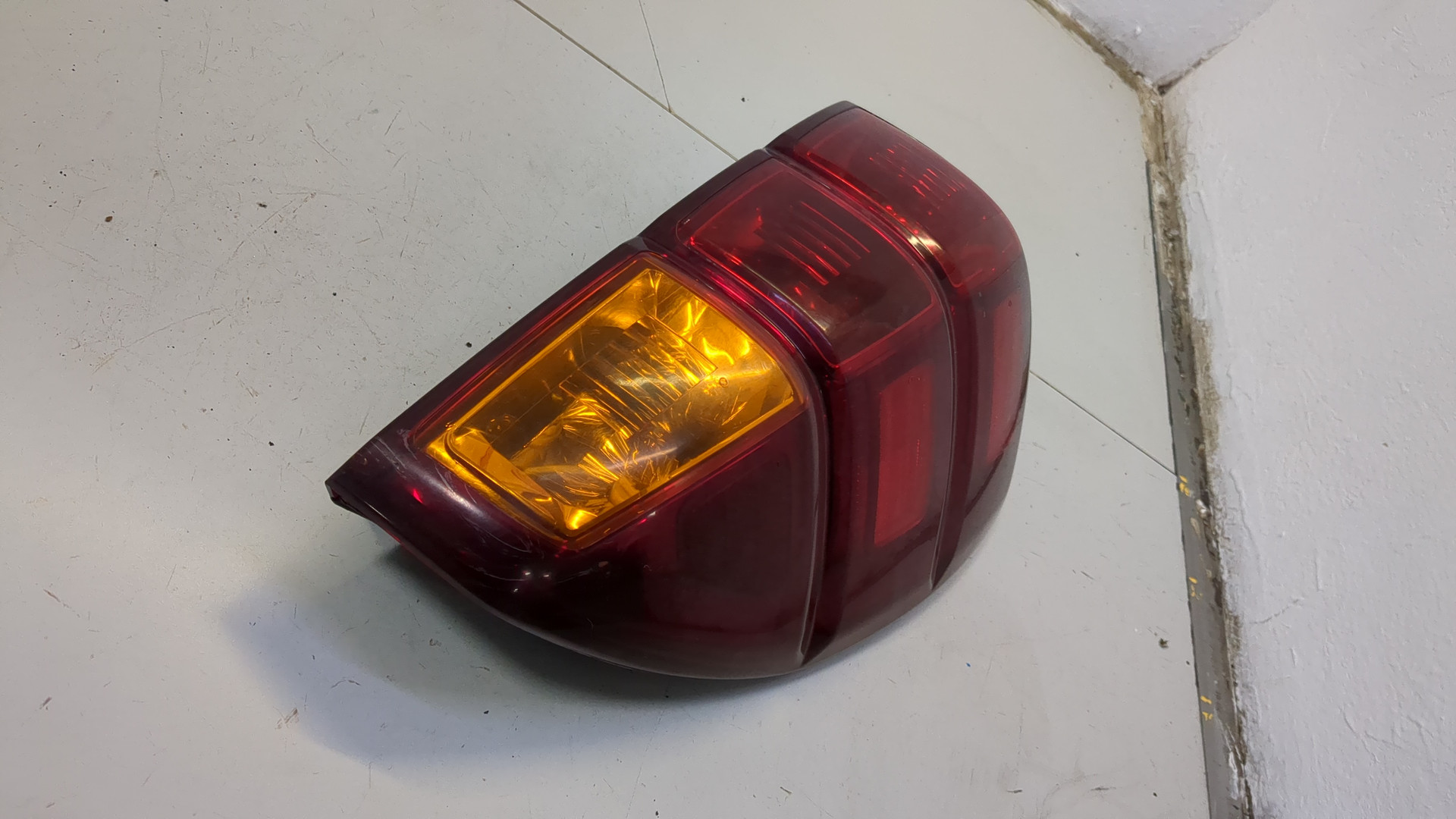 Фонарь задний левый