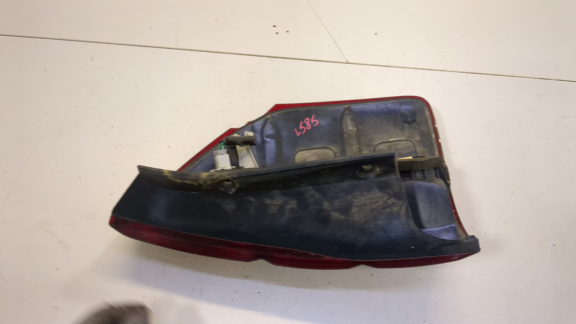 Фонарь задний левый