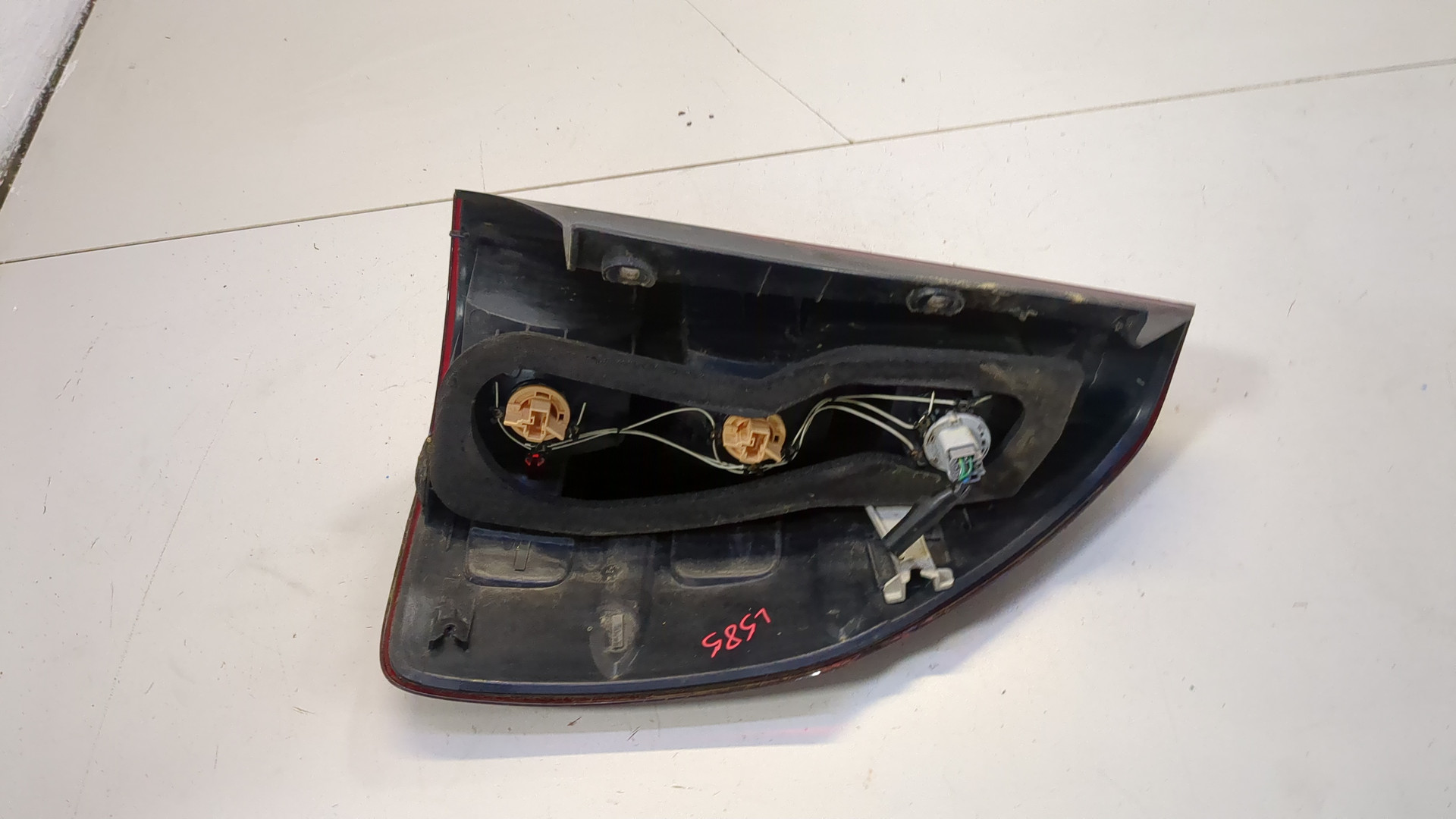 Фонарь задний левый