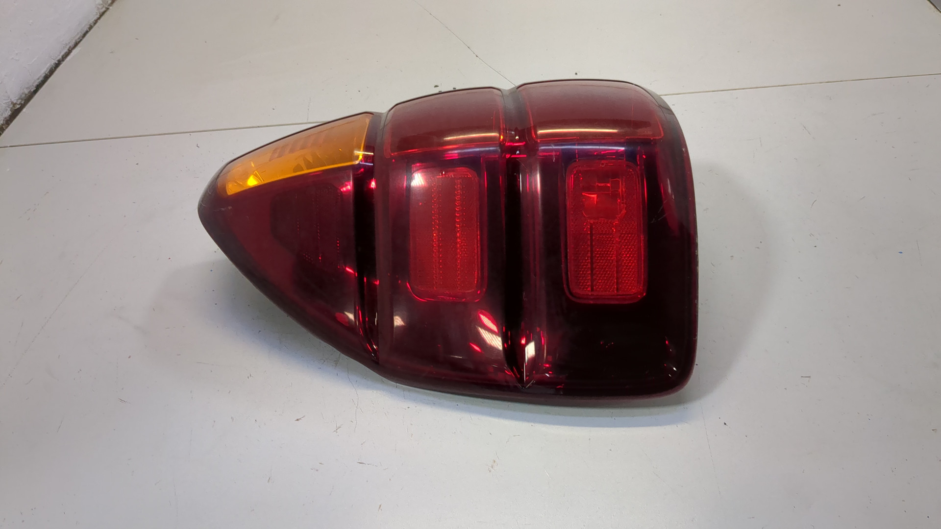 Фонарь задний левый