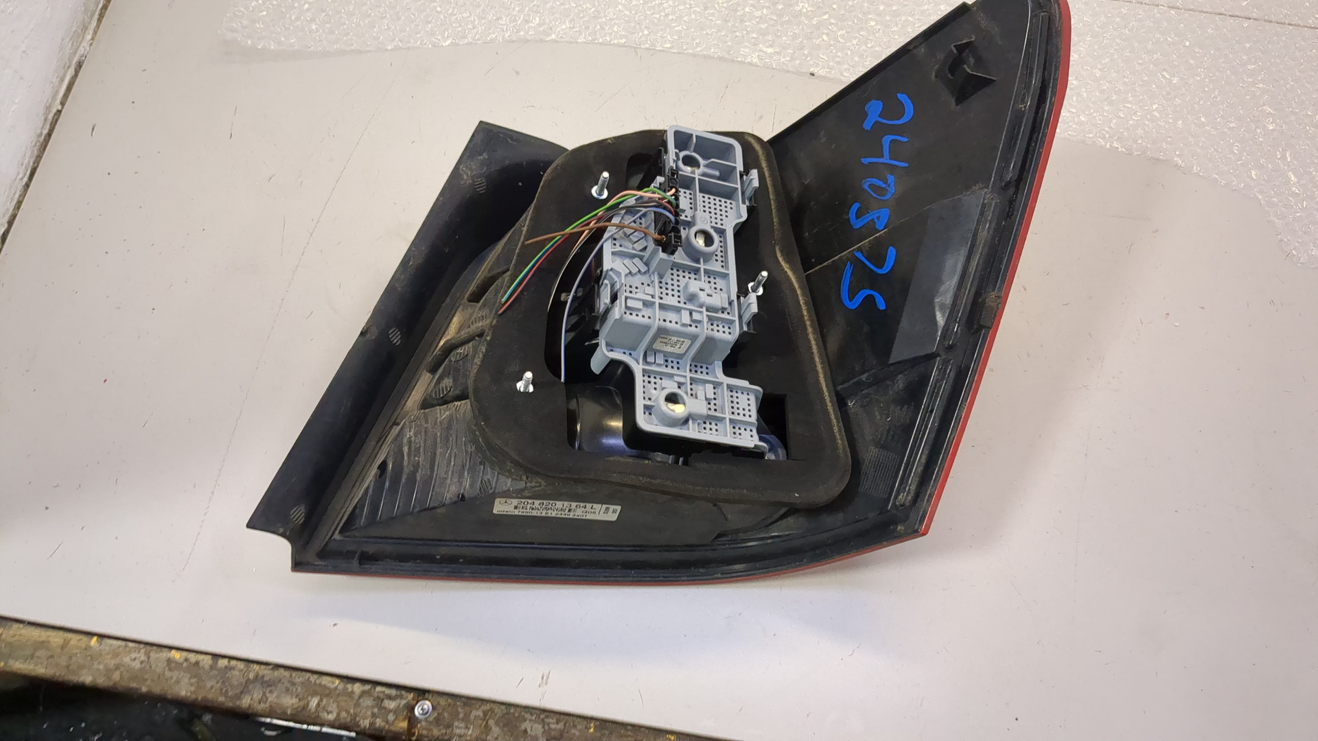 Фонарь задний левый