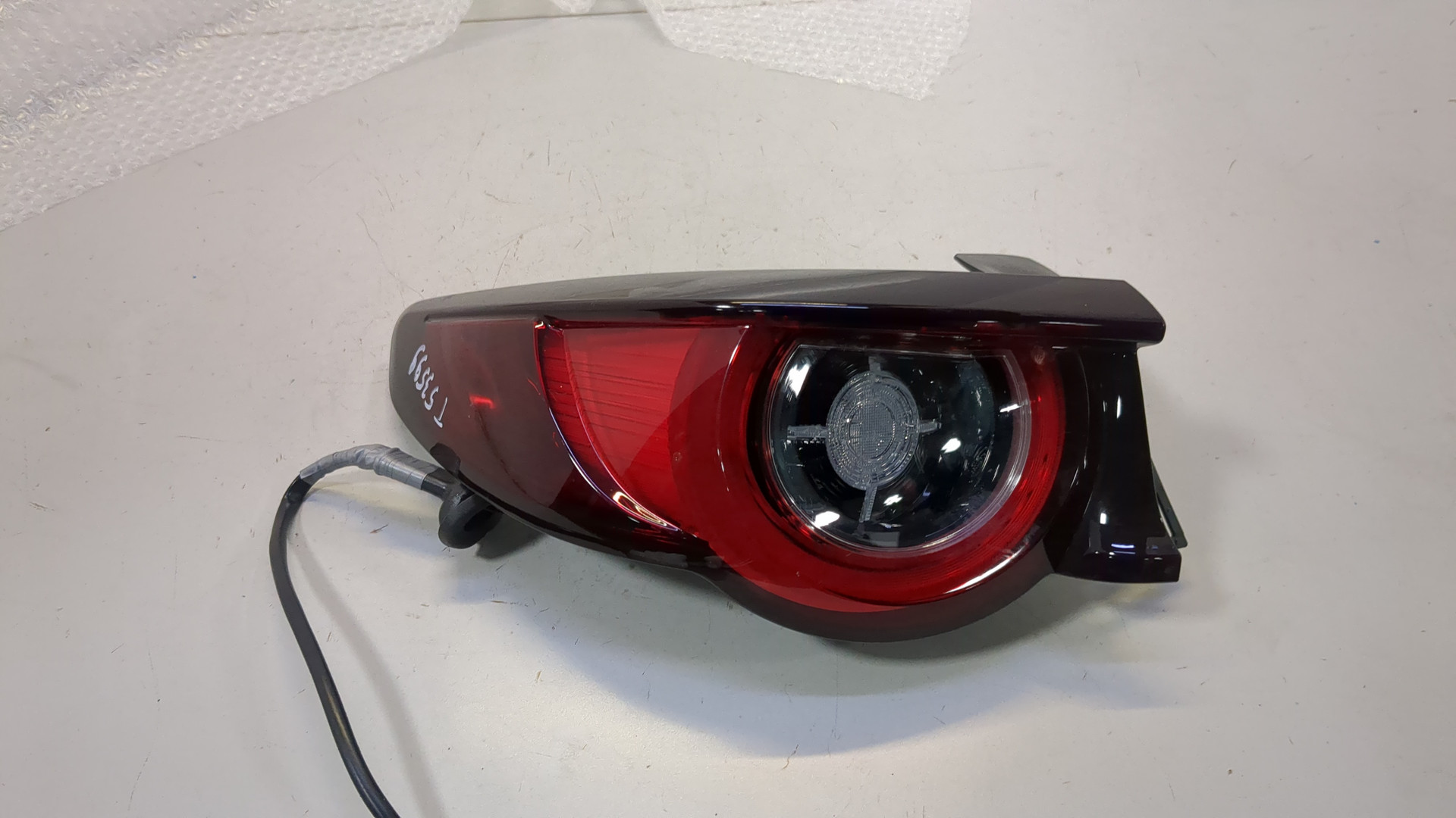 Фонарь задний левый