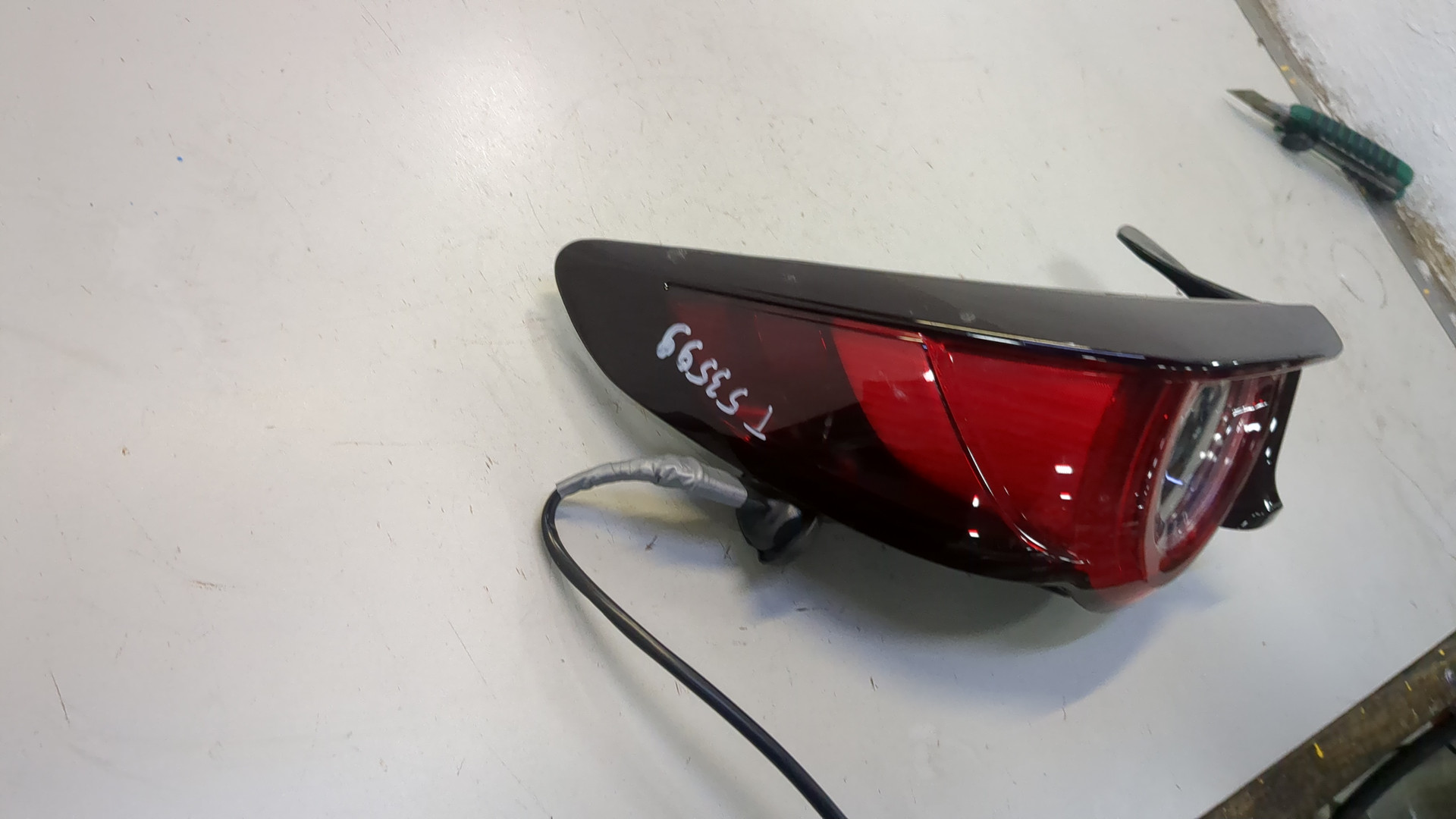 Фонарь задний левый