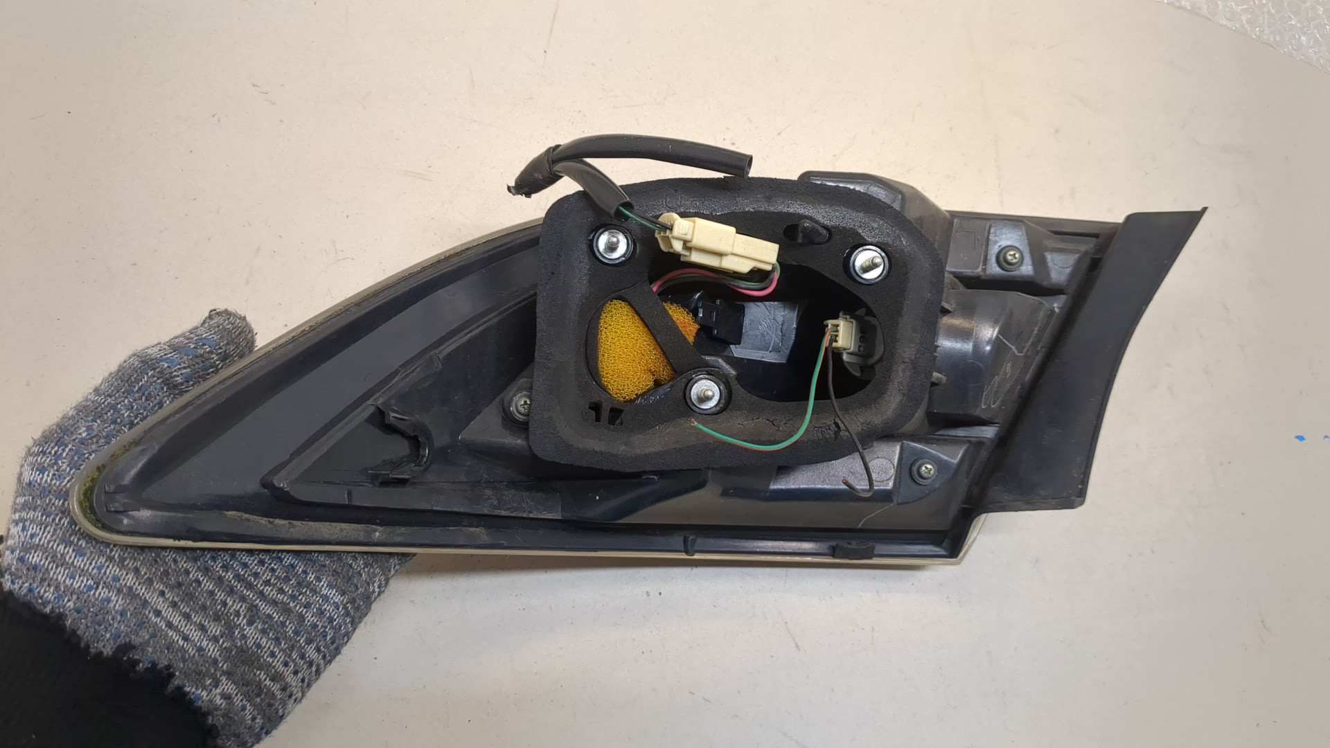 Фонарь задний левый