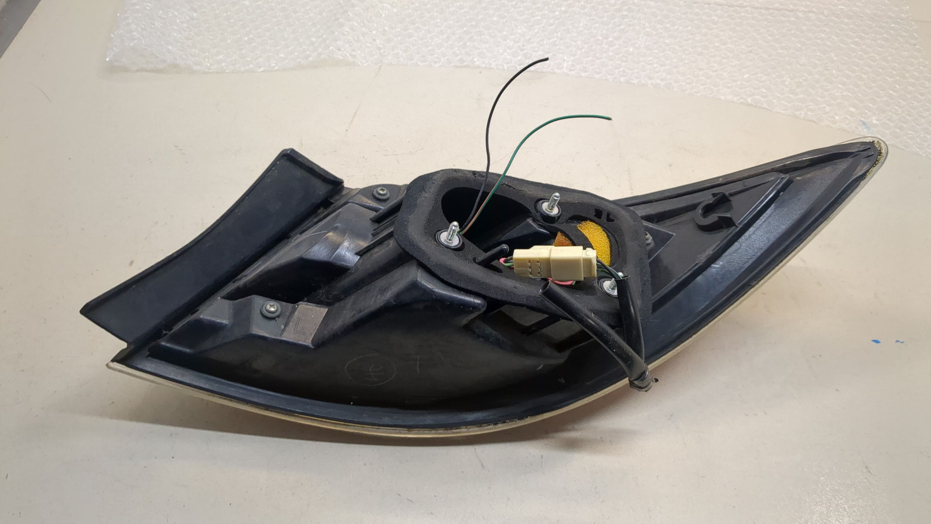 Фонарь задний левый