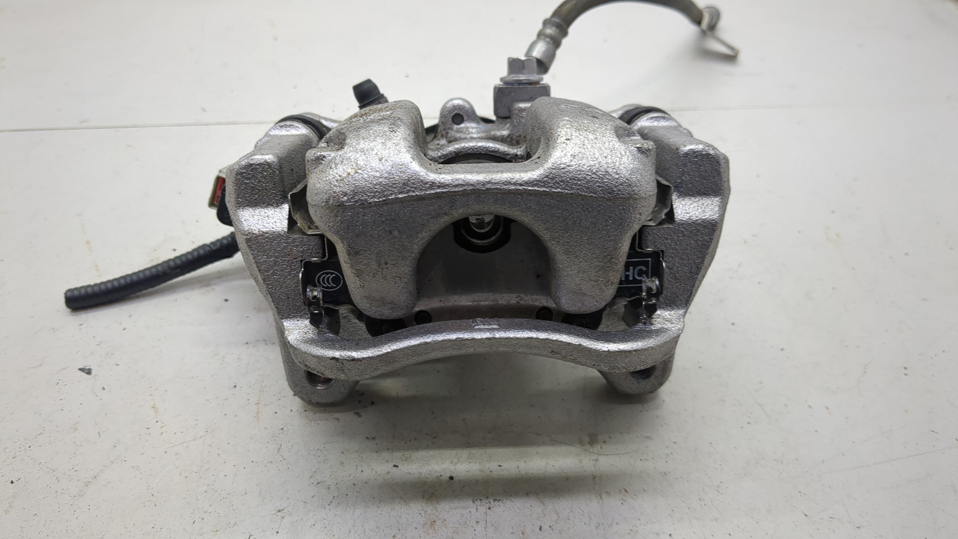 Суппорт задний левый