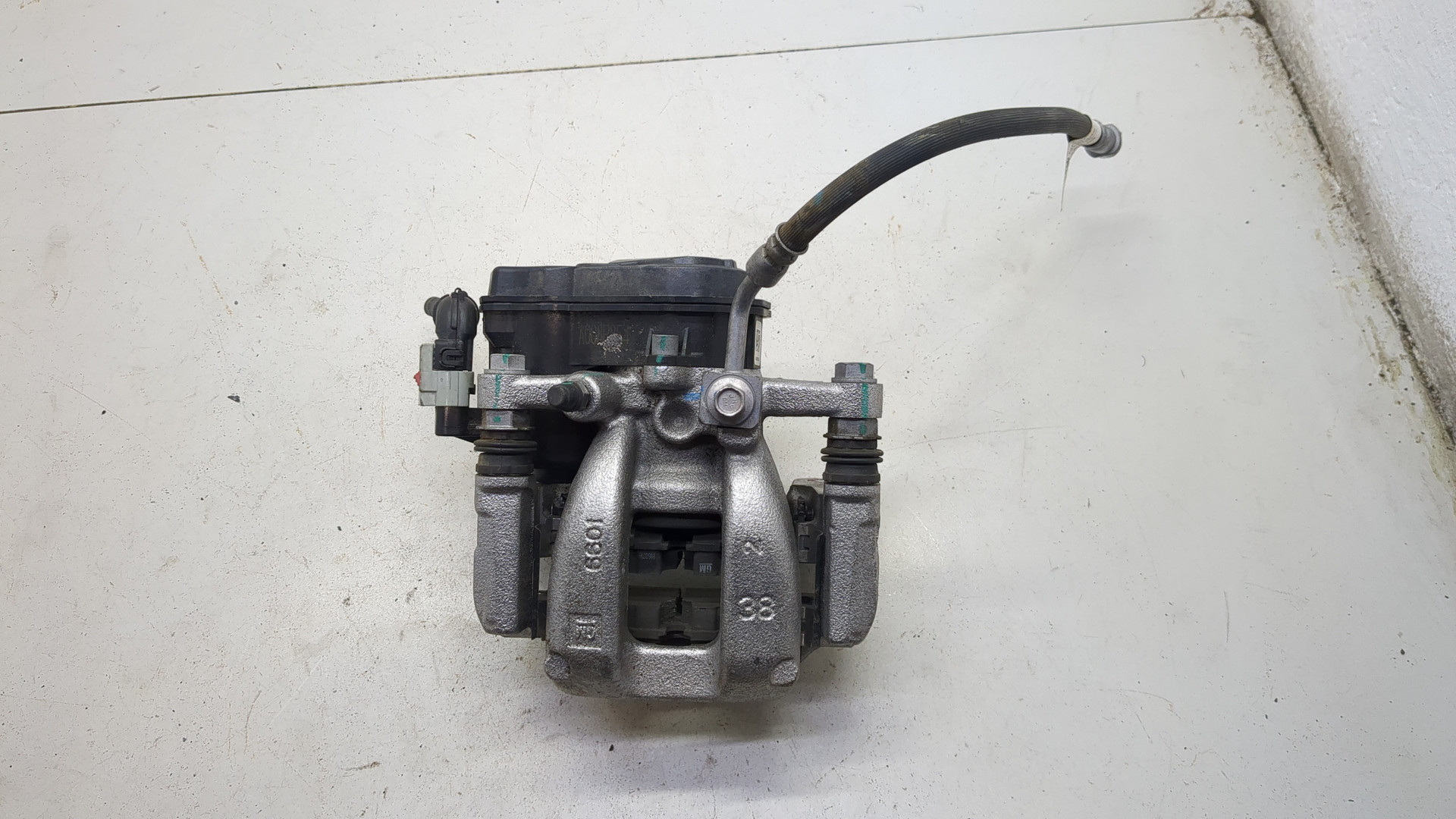 Суппорт задний левый